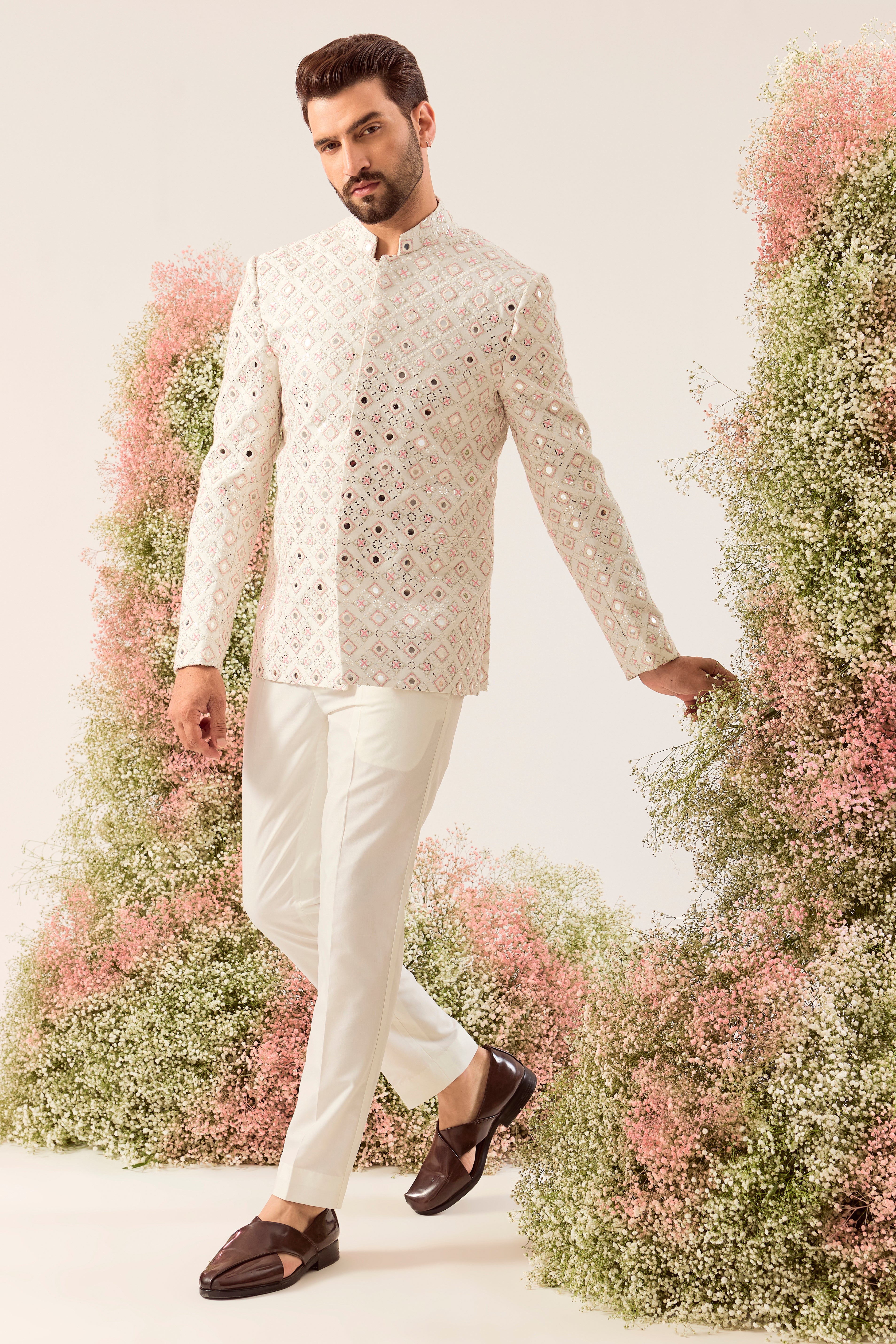 our signature white mirror work bandgala with intricate peach thread work and sequin details