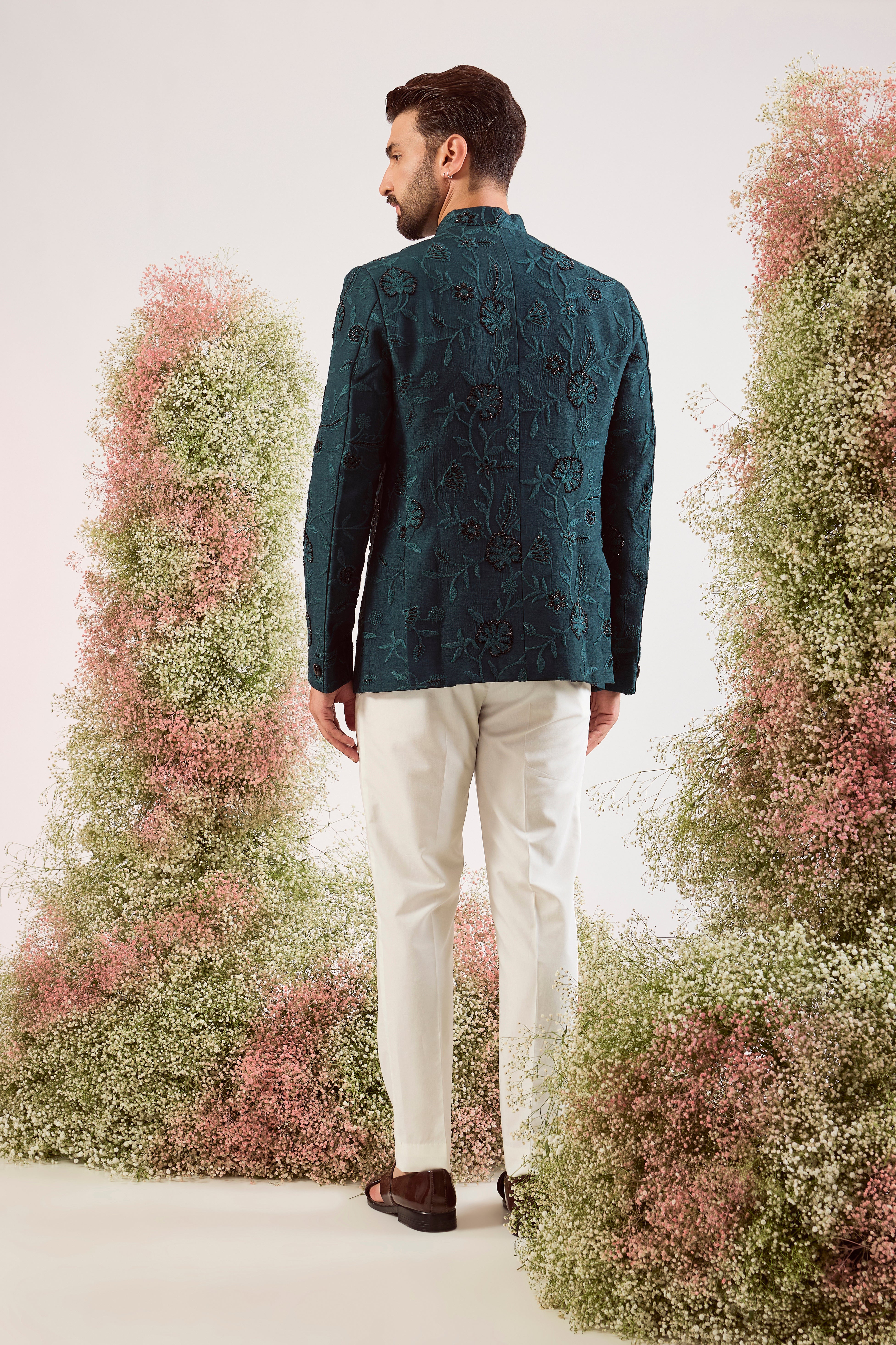 teal bandgala with intricate floral embroidery and sleek black cut dana work