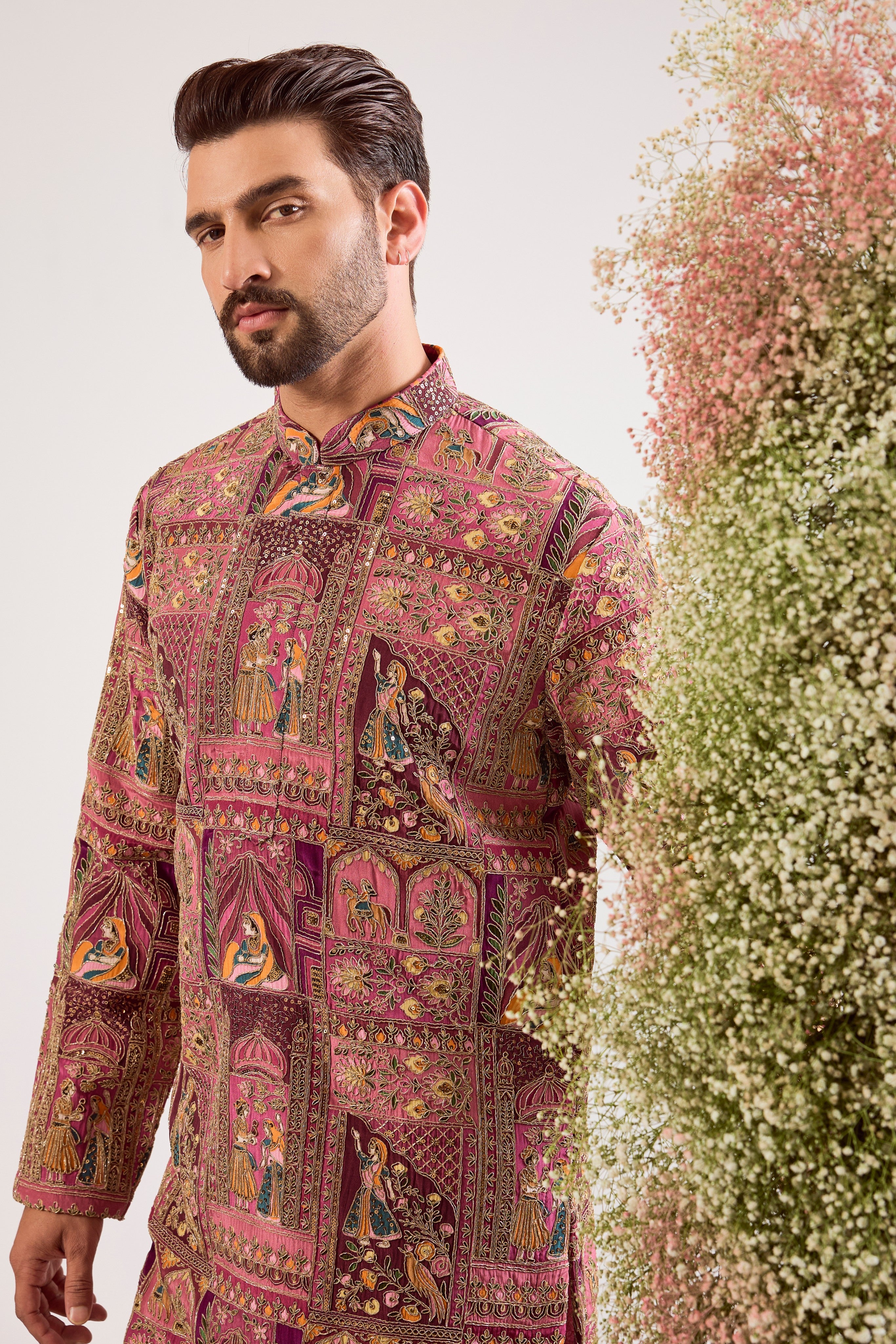 This regal purple royal heritage kurta is a true masterpiece of traditional artistry.