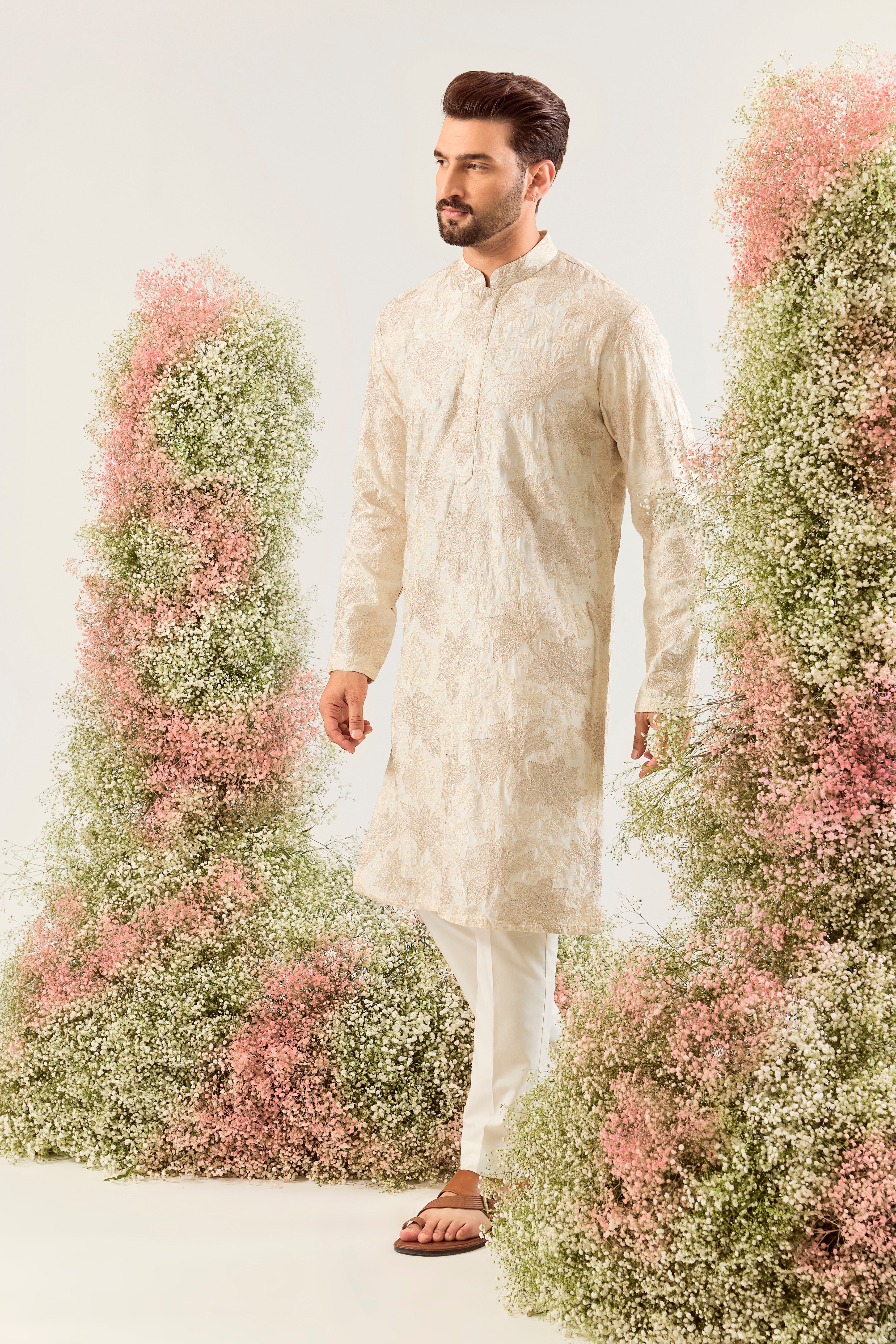 cream floral chikankari kurta with intricate two tone thread work