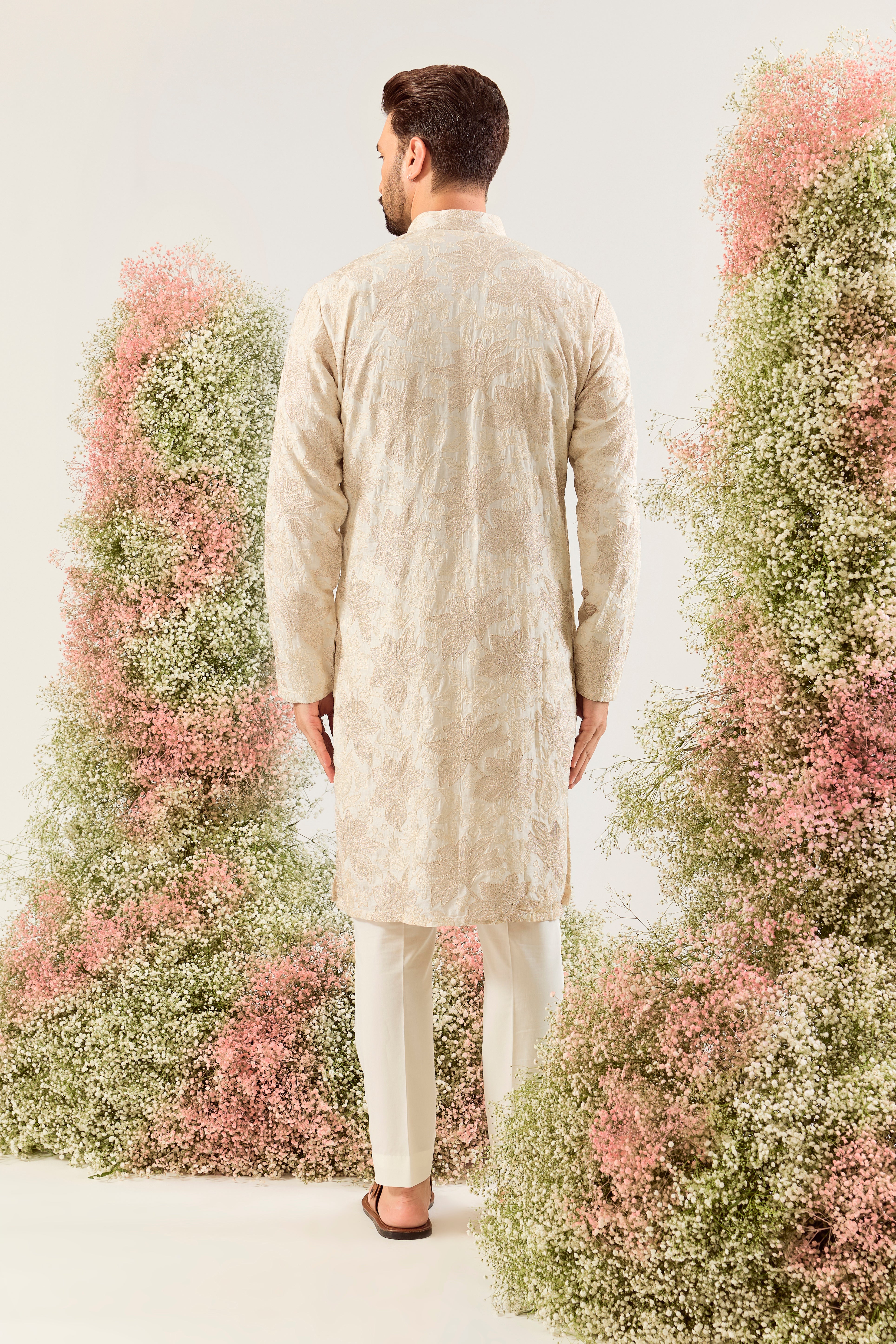 cream floral chikankari kurta with intricate two tone thread work