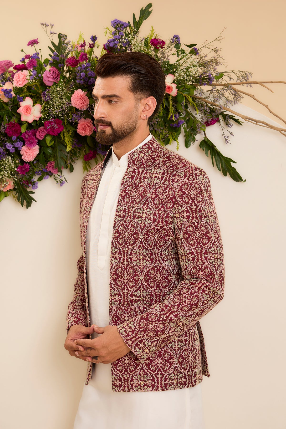 A Maroon Bandhgala Richly Embellished with threadwork