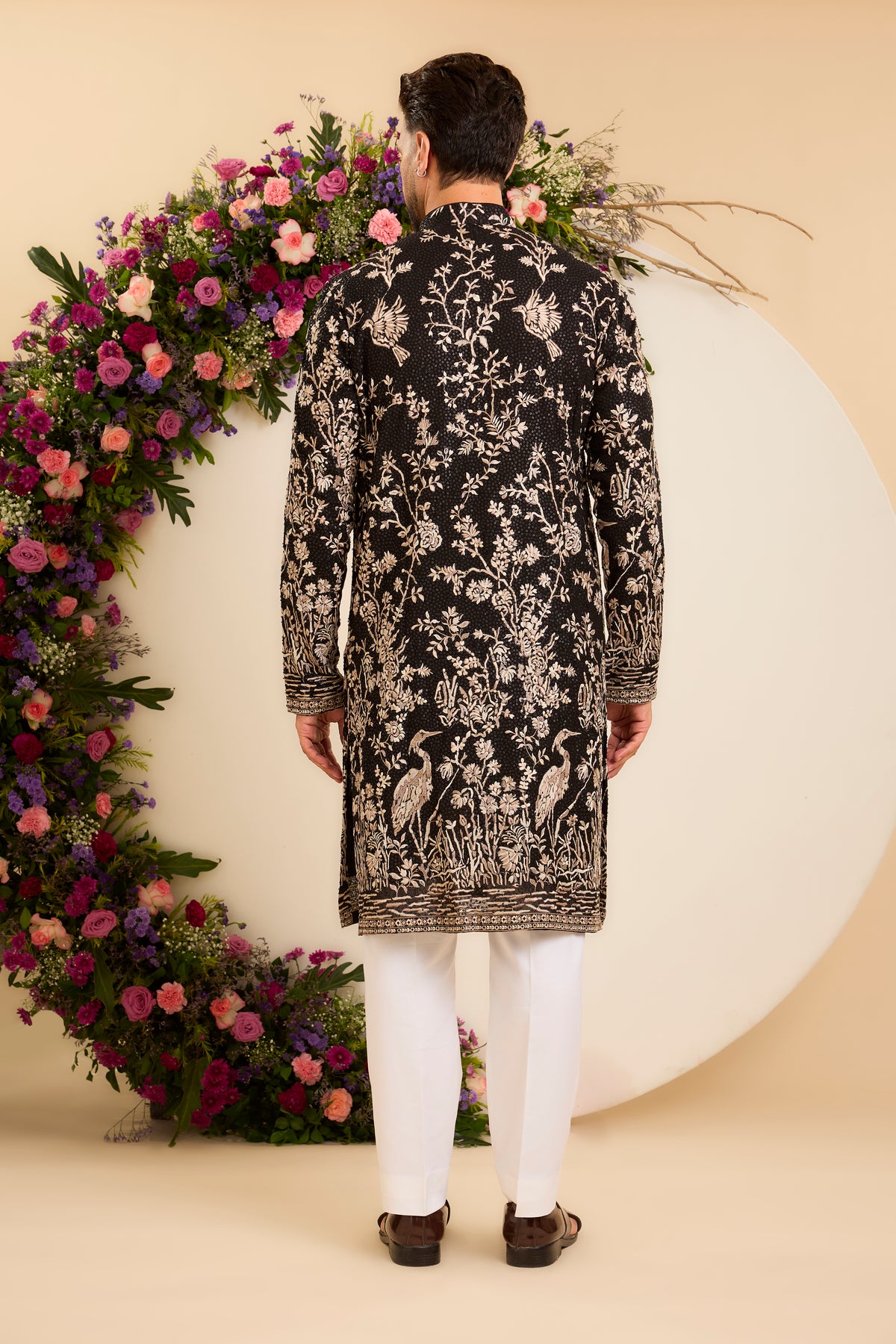 A Midnight Sequin Kurta Embellished in Golden Threadwork and majestic flamingos