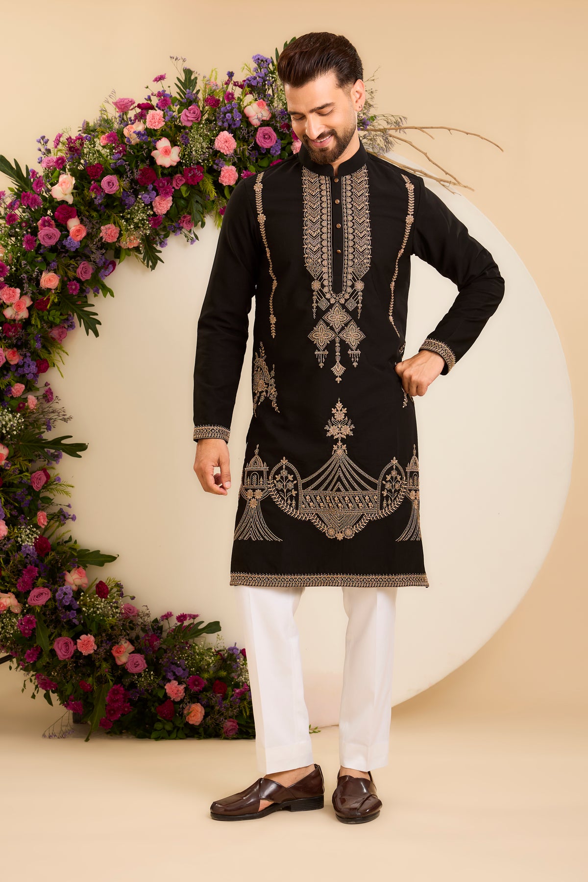 A Timeless Black Kurta Enriched with Intricate Antique Gold Embroidery