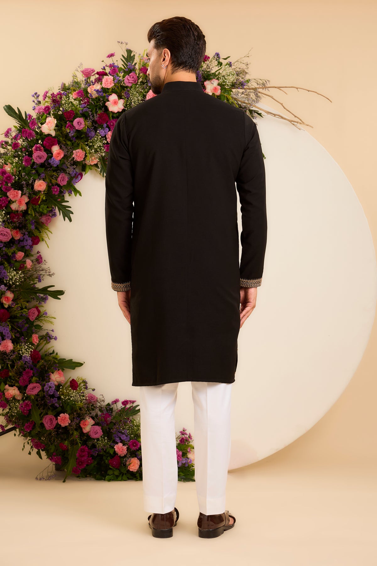 A Timeless Black Kurta Enriched with Intricate Antique Gold Embroidery