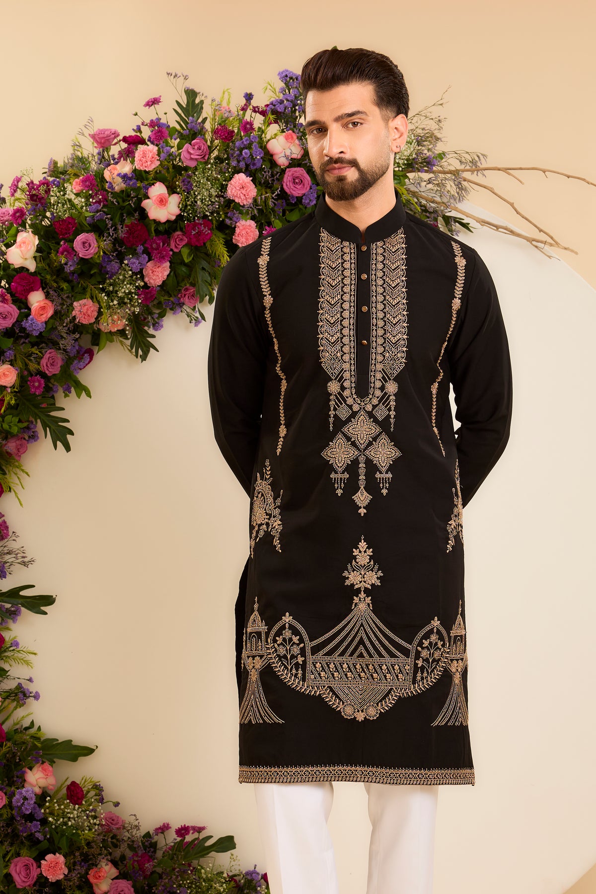 A Timeless Black Kurta Enriched with Intricate Antique Gold Embroidery