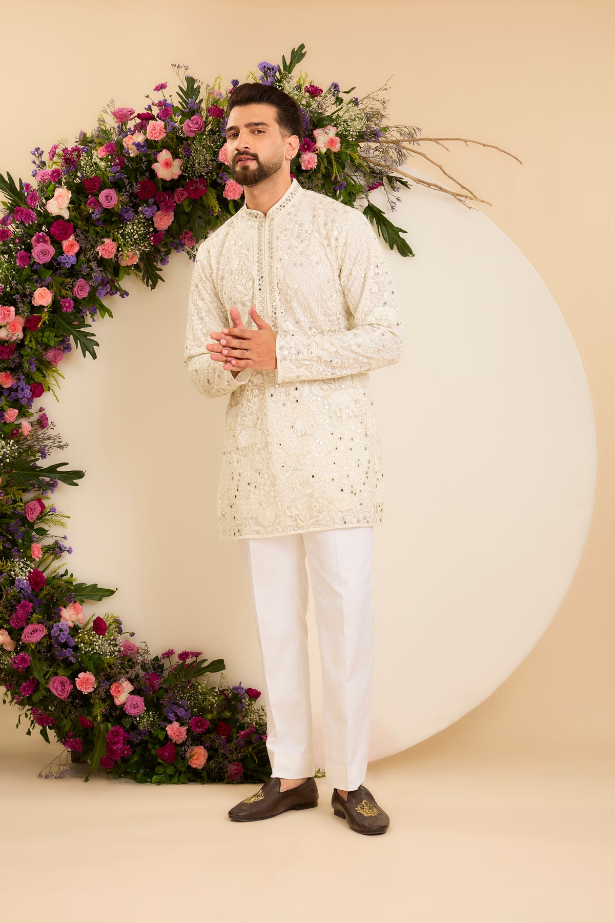 An Ivory Tropical Kurta Framed with Delicate Mirror-Like Embellishment