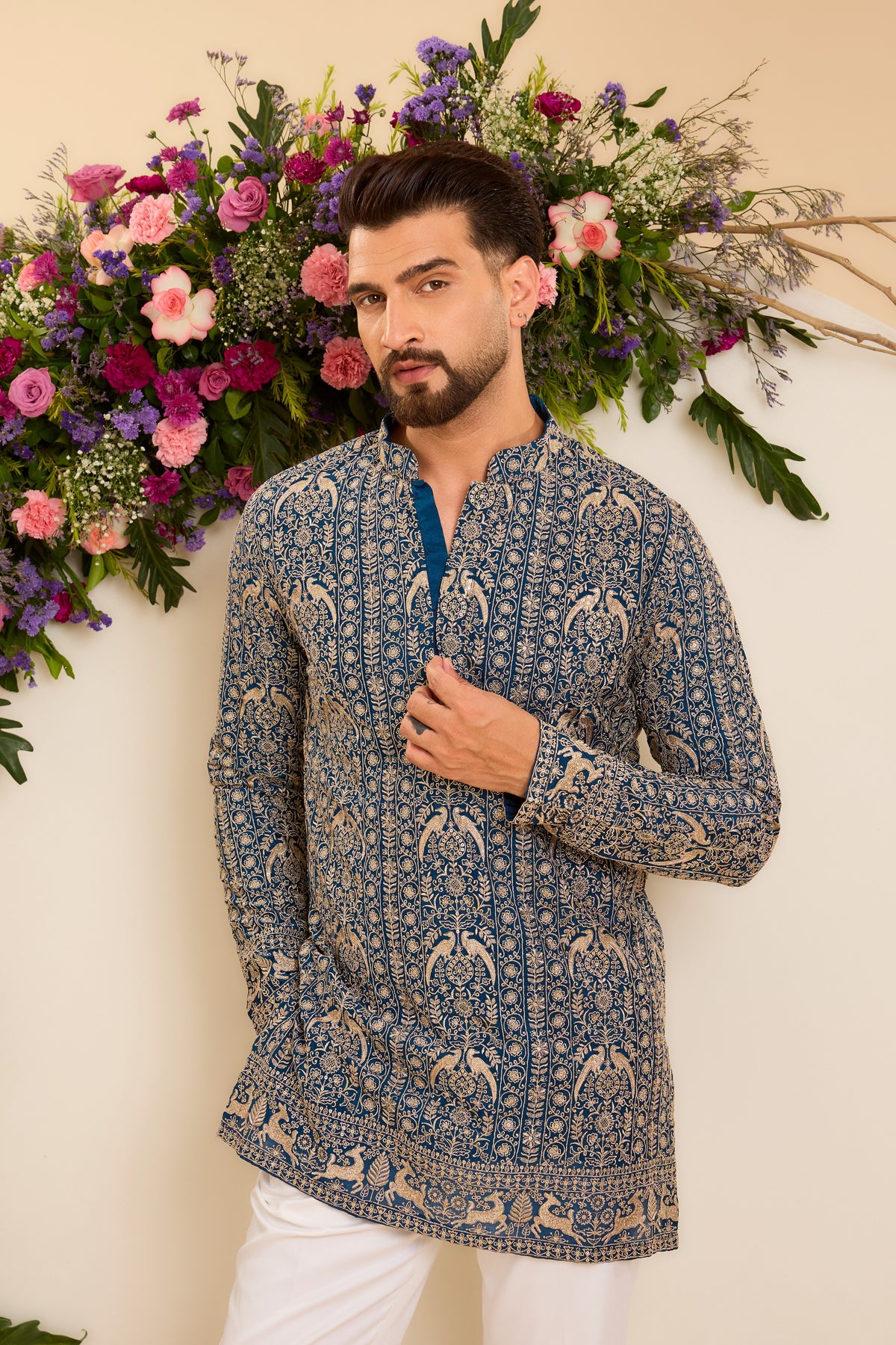 A Regal Blue short Kurta Woven with Ornate Zari Details