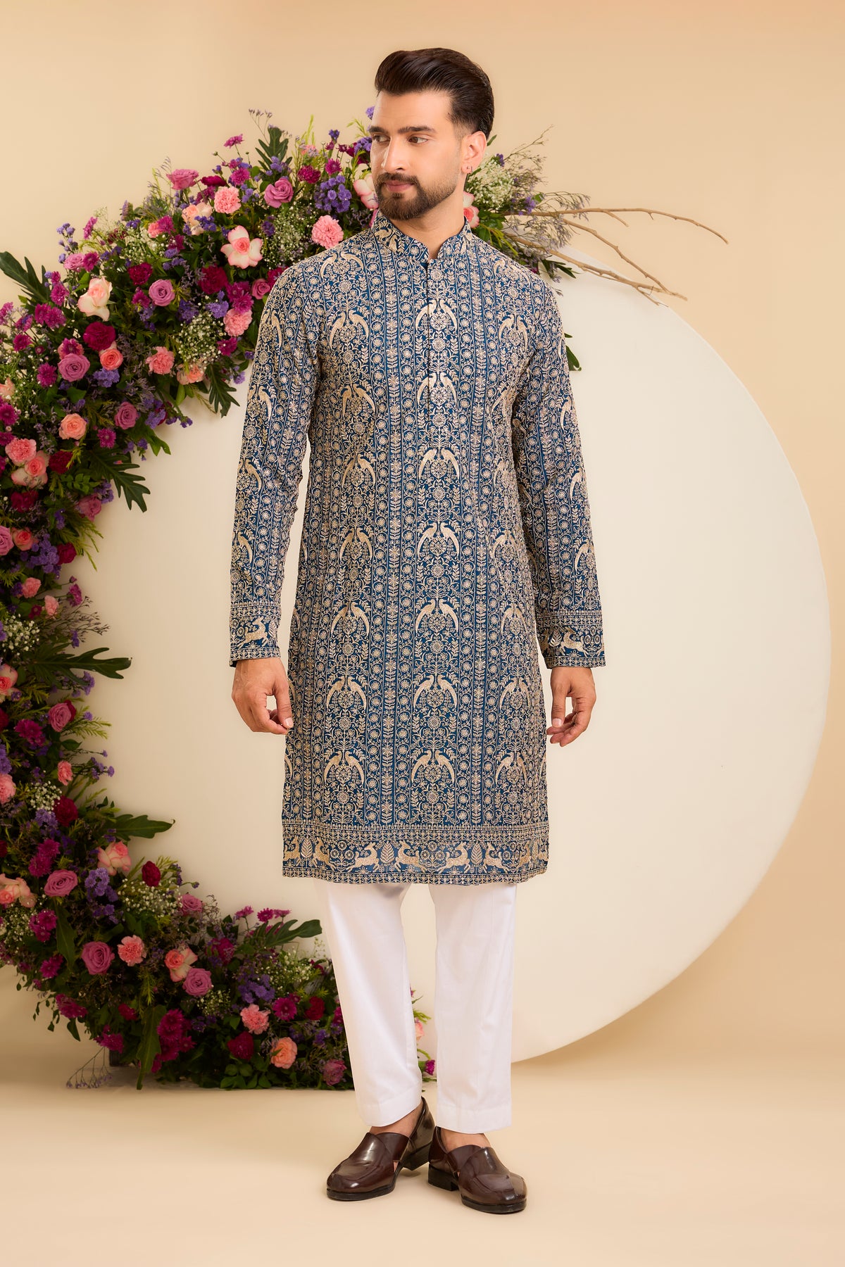 A Regal Blue long Kurta Woven with Ornate Zari Details