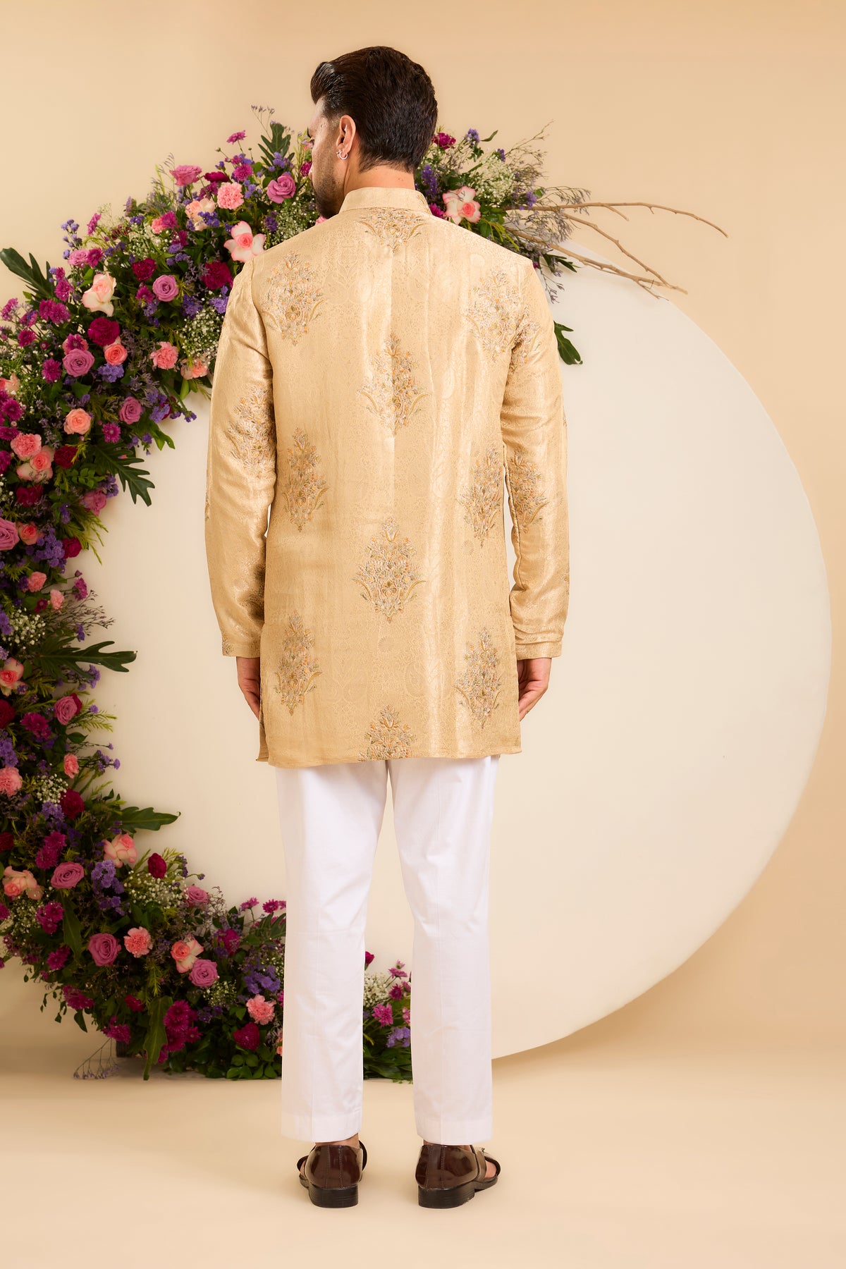 A Burnished Gold Kurta Adorned with Floral Embroidery