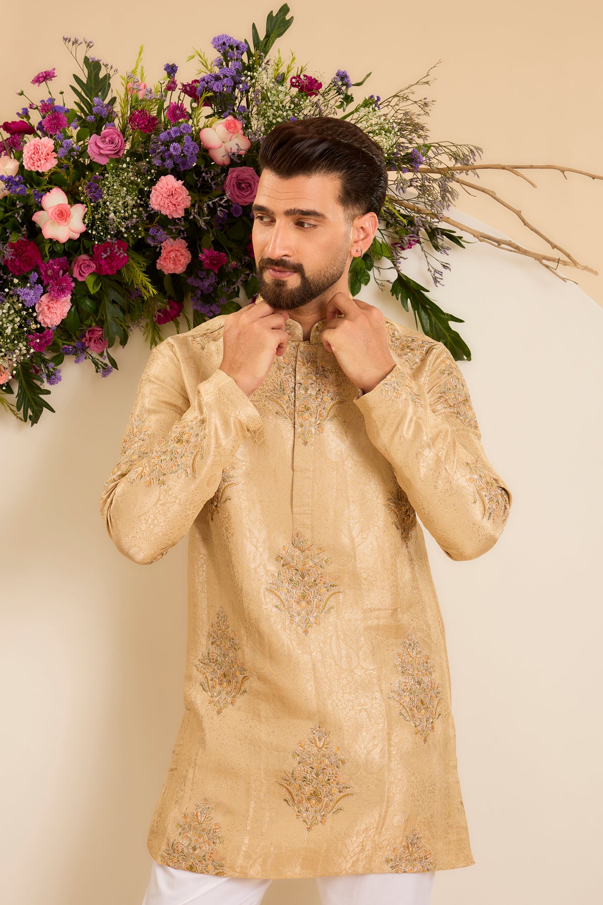 A Burnished Gold Kurta Adorned with Floral Embroidery