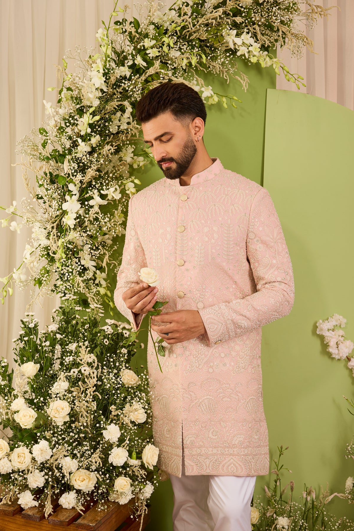 The Palais — A Pink Short Sherwani Richly Worked in Florals