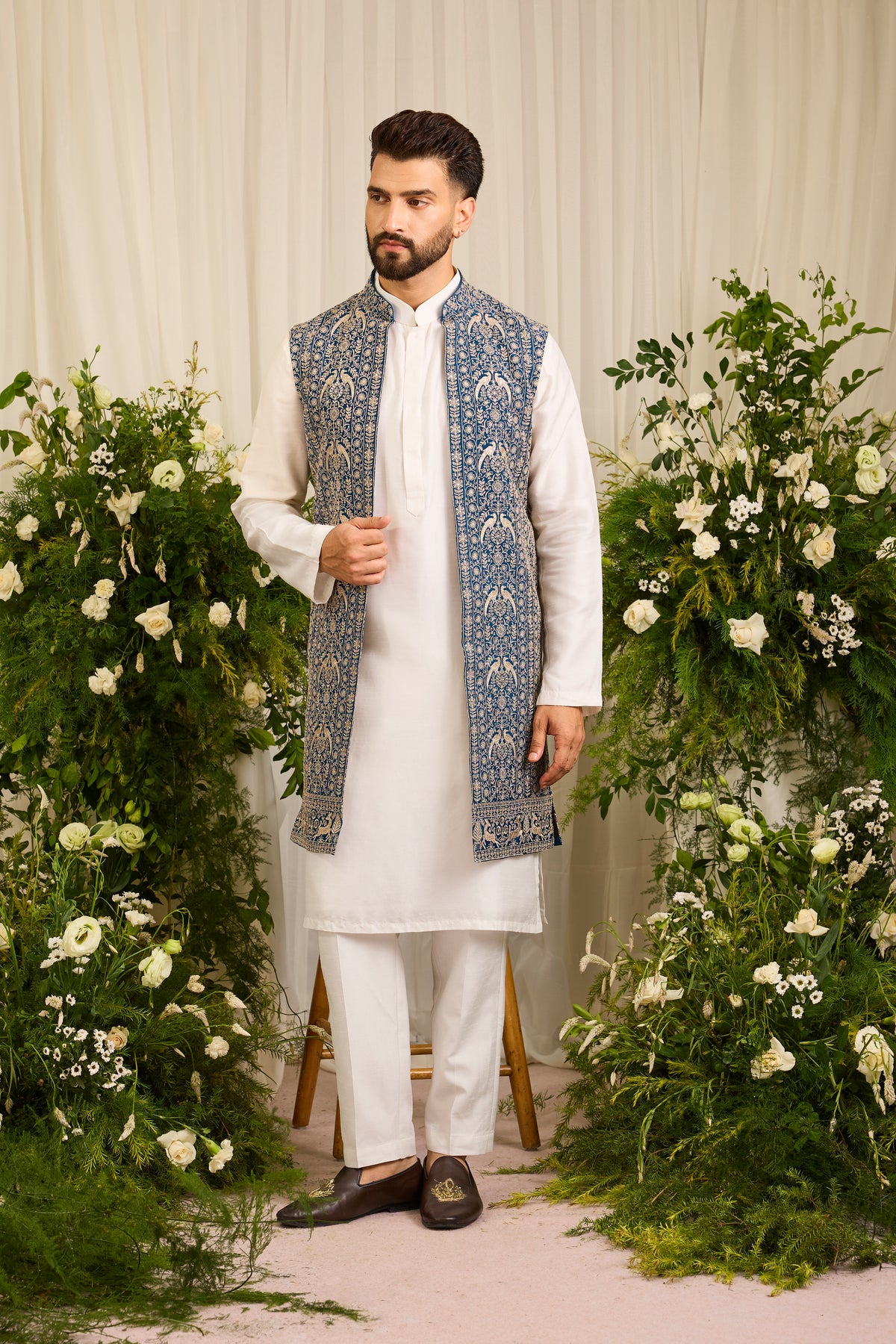 A Regal Blue long open jacket Woven with Ornate Zari Details