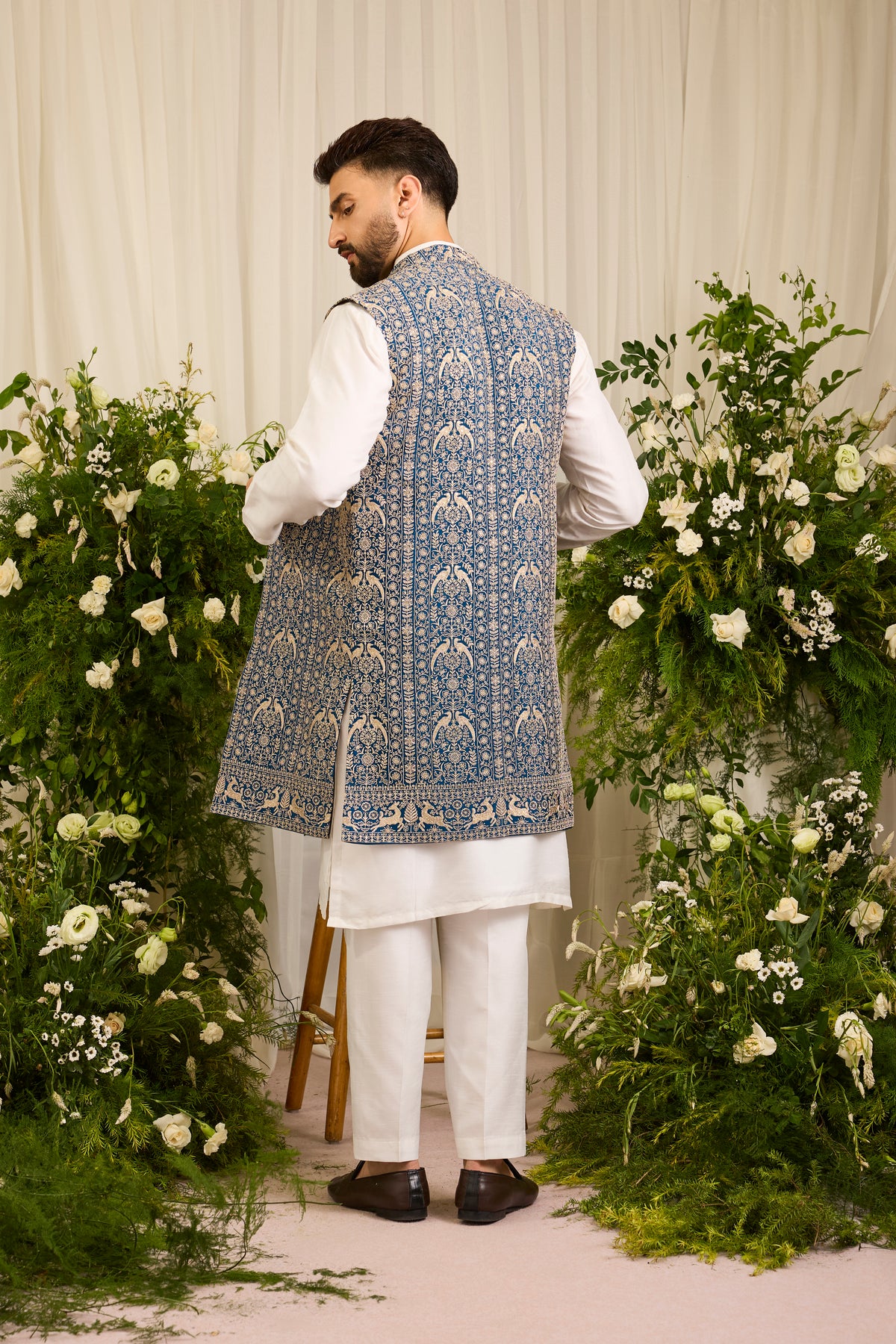 A Regal Blue long open jacket Woven with Ornate Zari Details