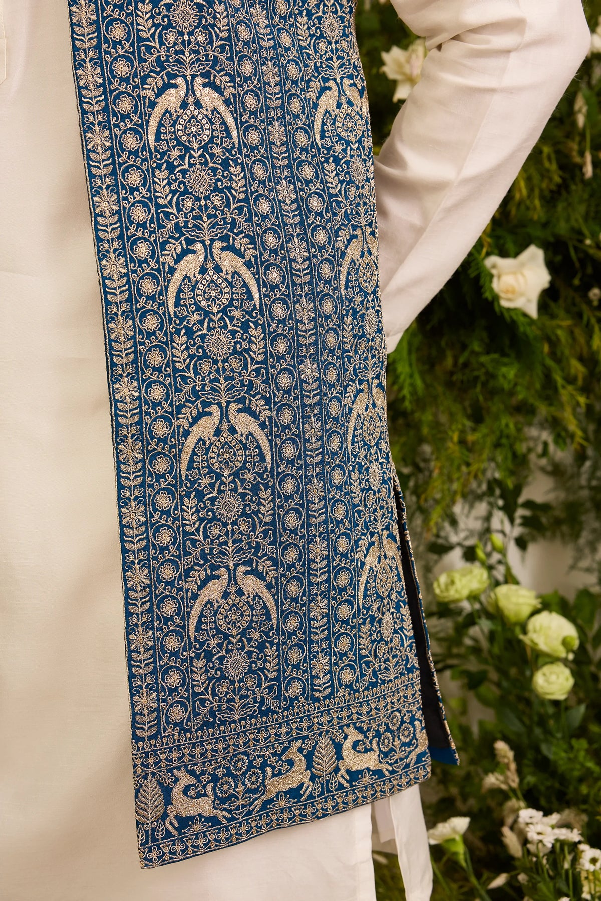 A Regal Blue long open jacket Woven with Ornate Zari Details