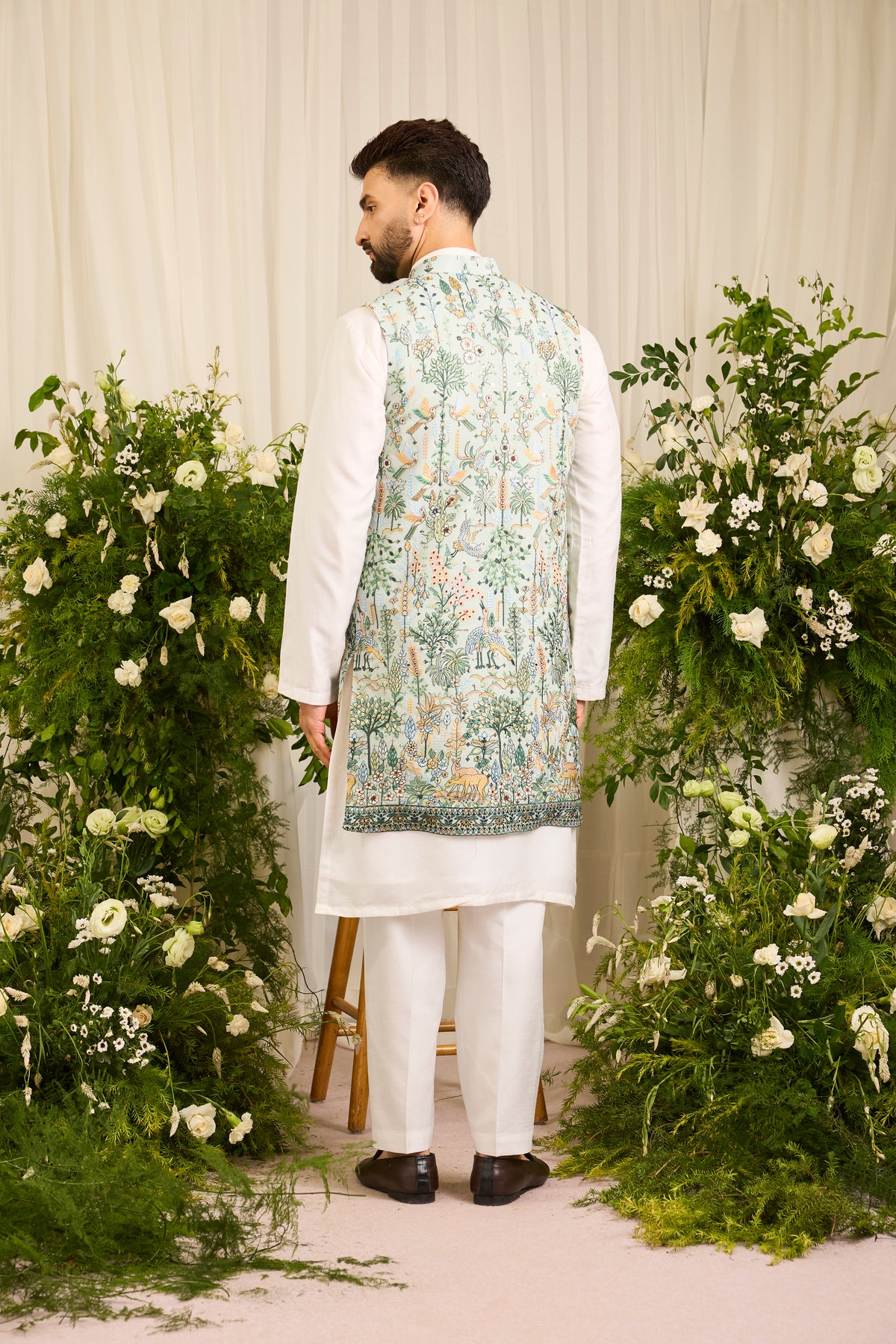 A Blue-green long open jacket Alive with Tropical Embroidery
