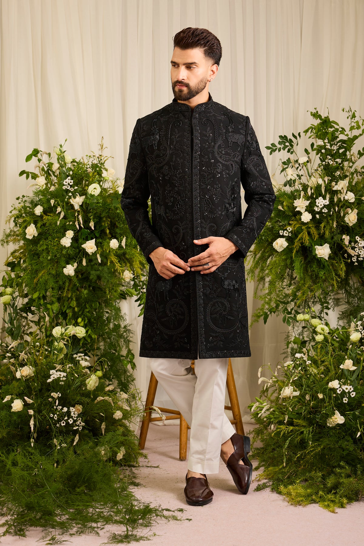 The Royal Crest - Black Sherwani Defined by Sculptural Deer Embroidery