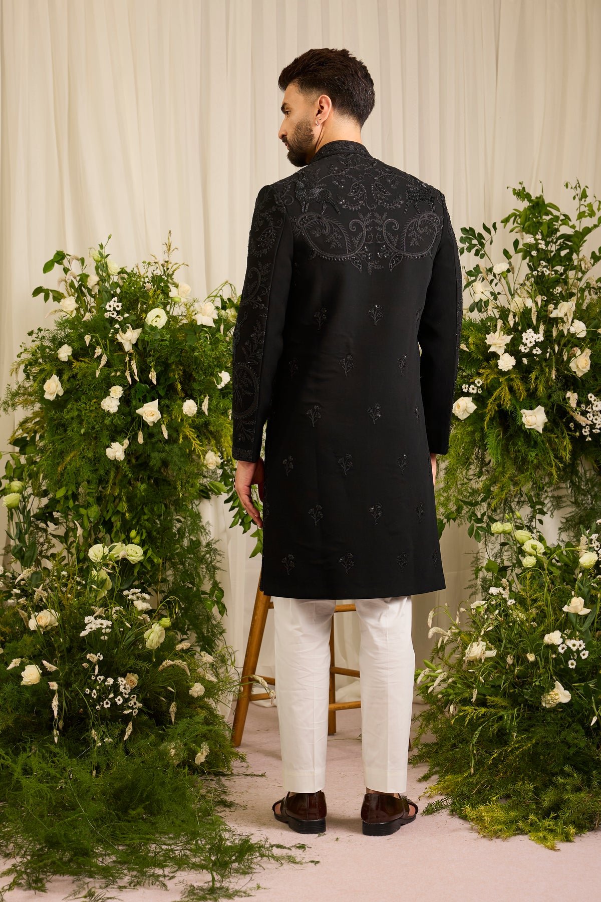 The Royal Crest - Black Sherwani Defined by Sculptural Deer Embroidery