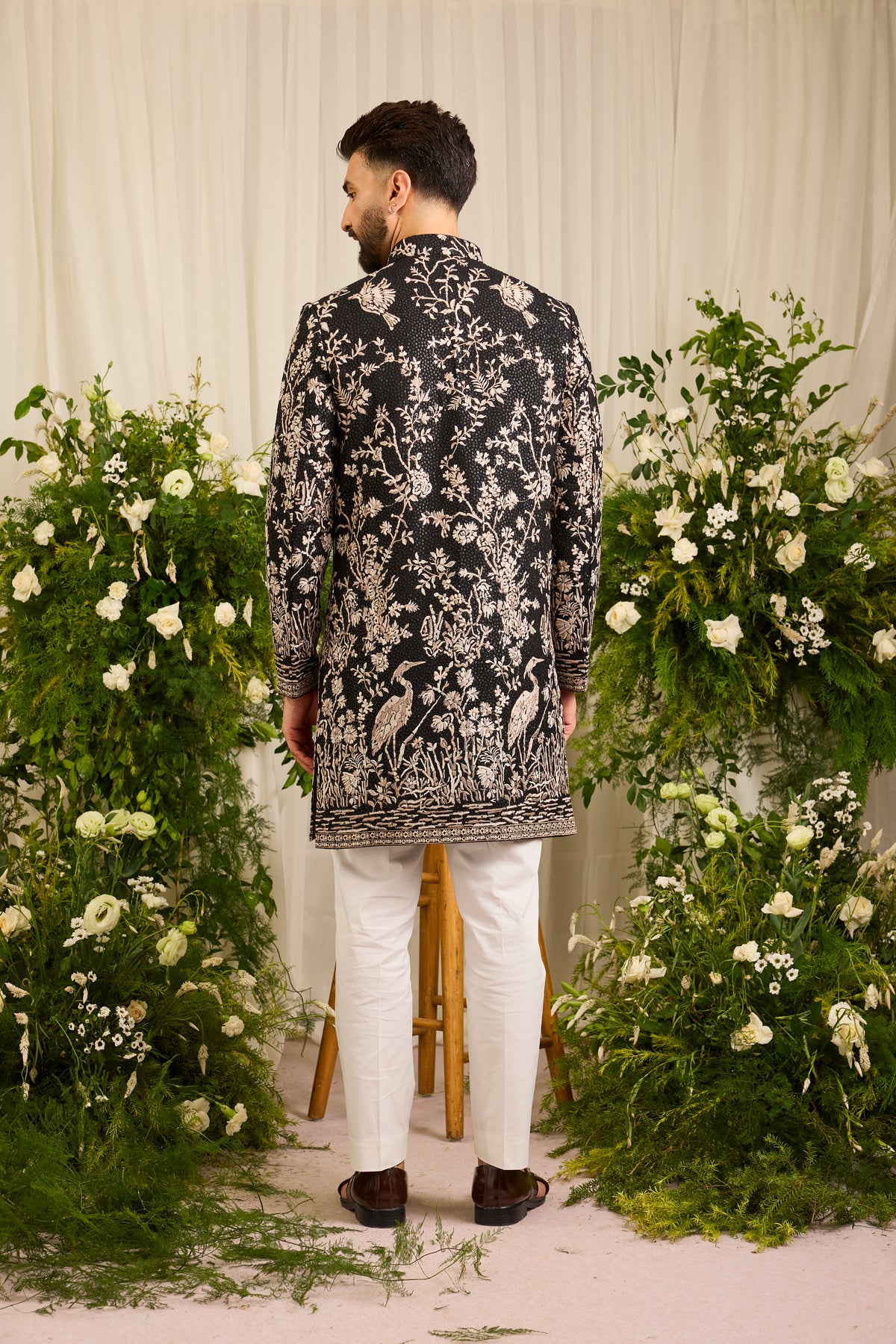 A Midnight Sequin short sherwani Embellished in Golden Threadwork and majestic flamingos