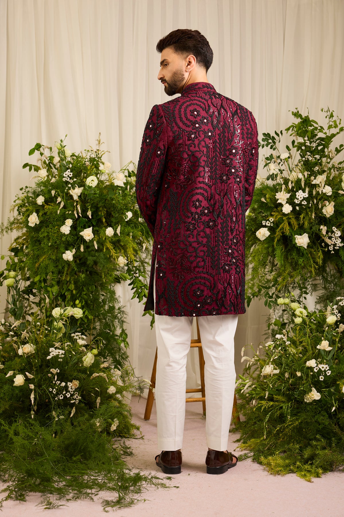 The Lannister - A Maroon Sherwani with Sculptural Black Embellishment