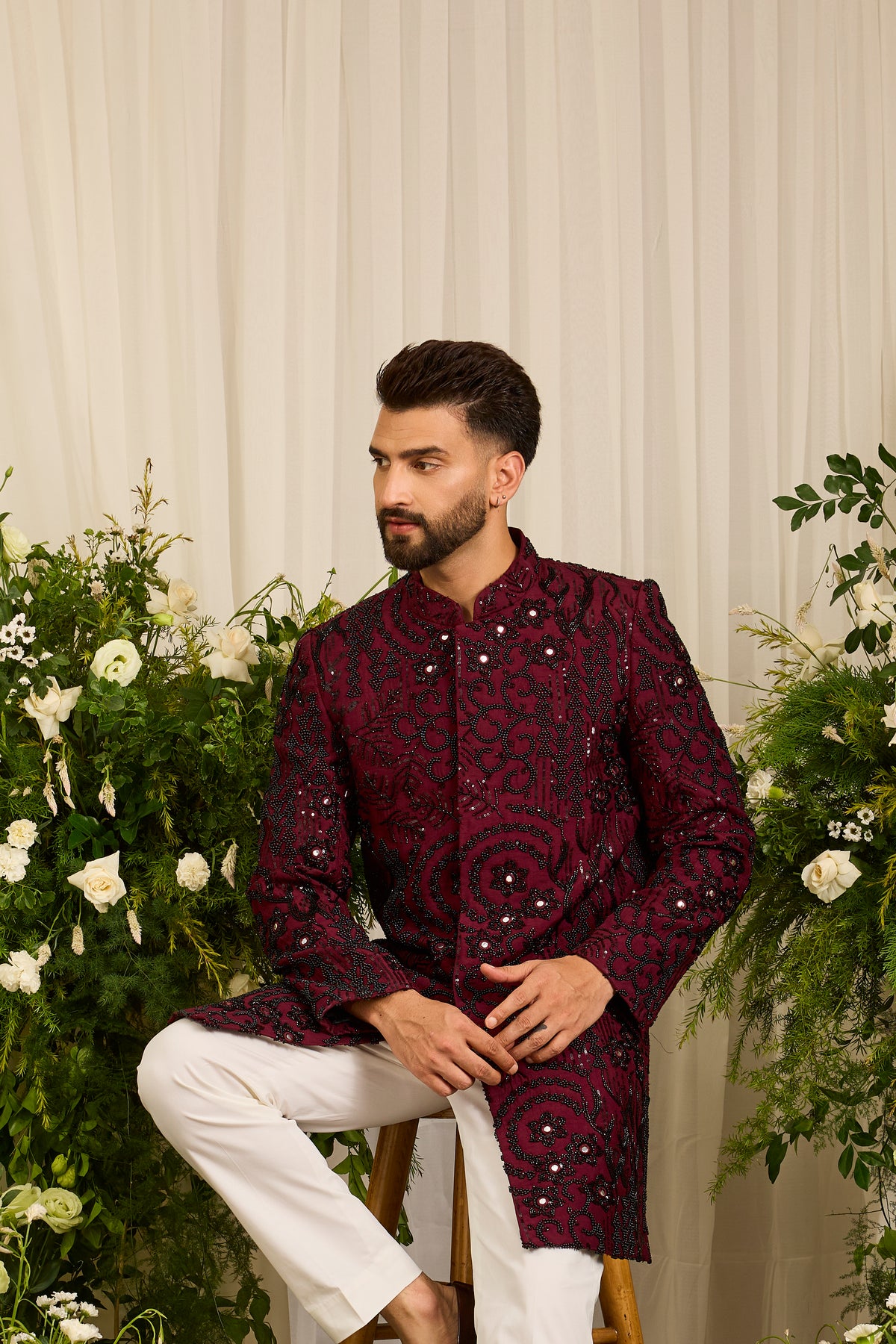 The Lannister - A Maroon Sherwani with Sculptural Black Embellishment
