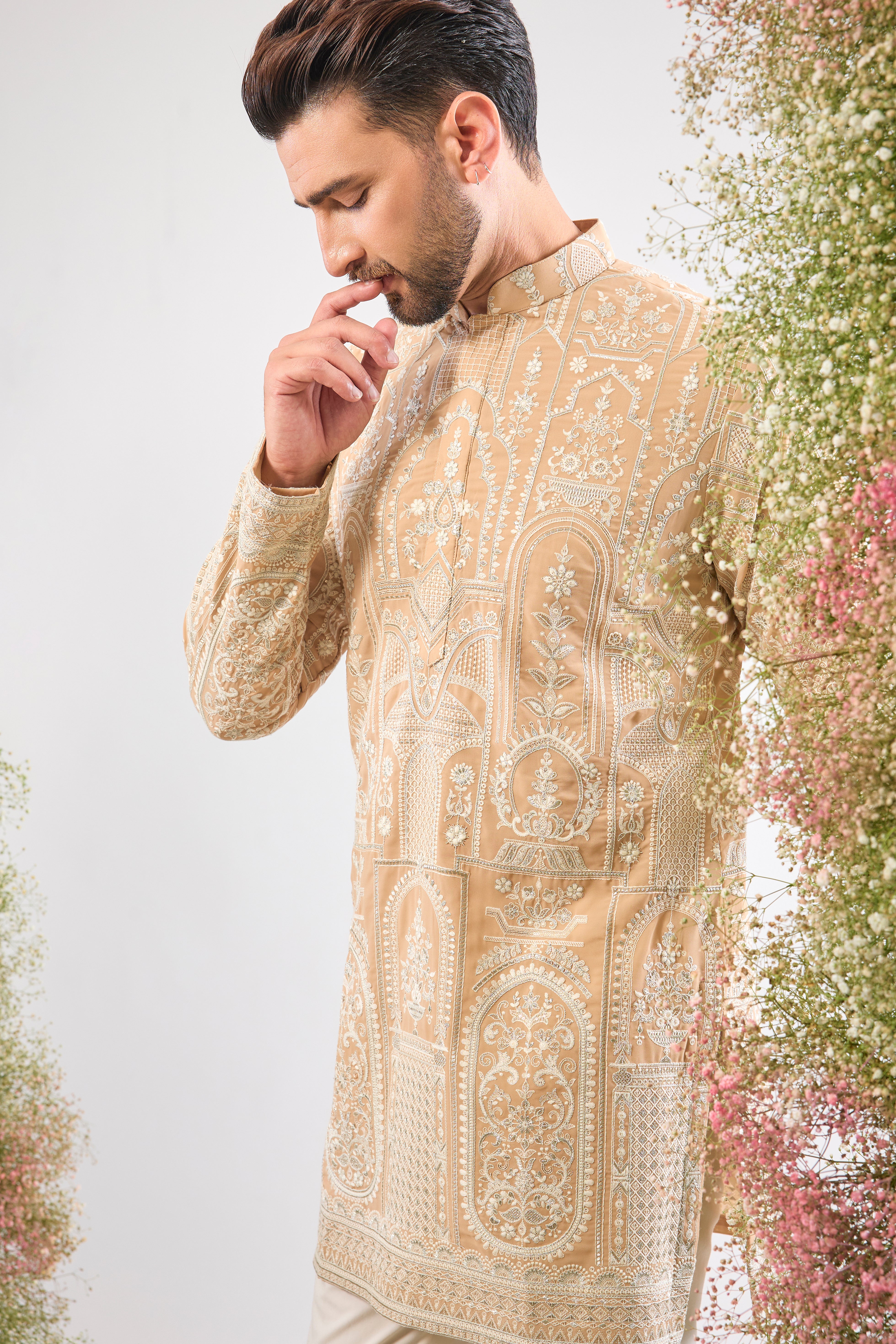 Our Mouse (Beige) Short Kurta offers a refined base for the beautiful texture of Intricate White Kashmiri Thread Work. The monochromatic palette is pure class and highlights the detailed craftsmanship perfectly. ποΈ