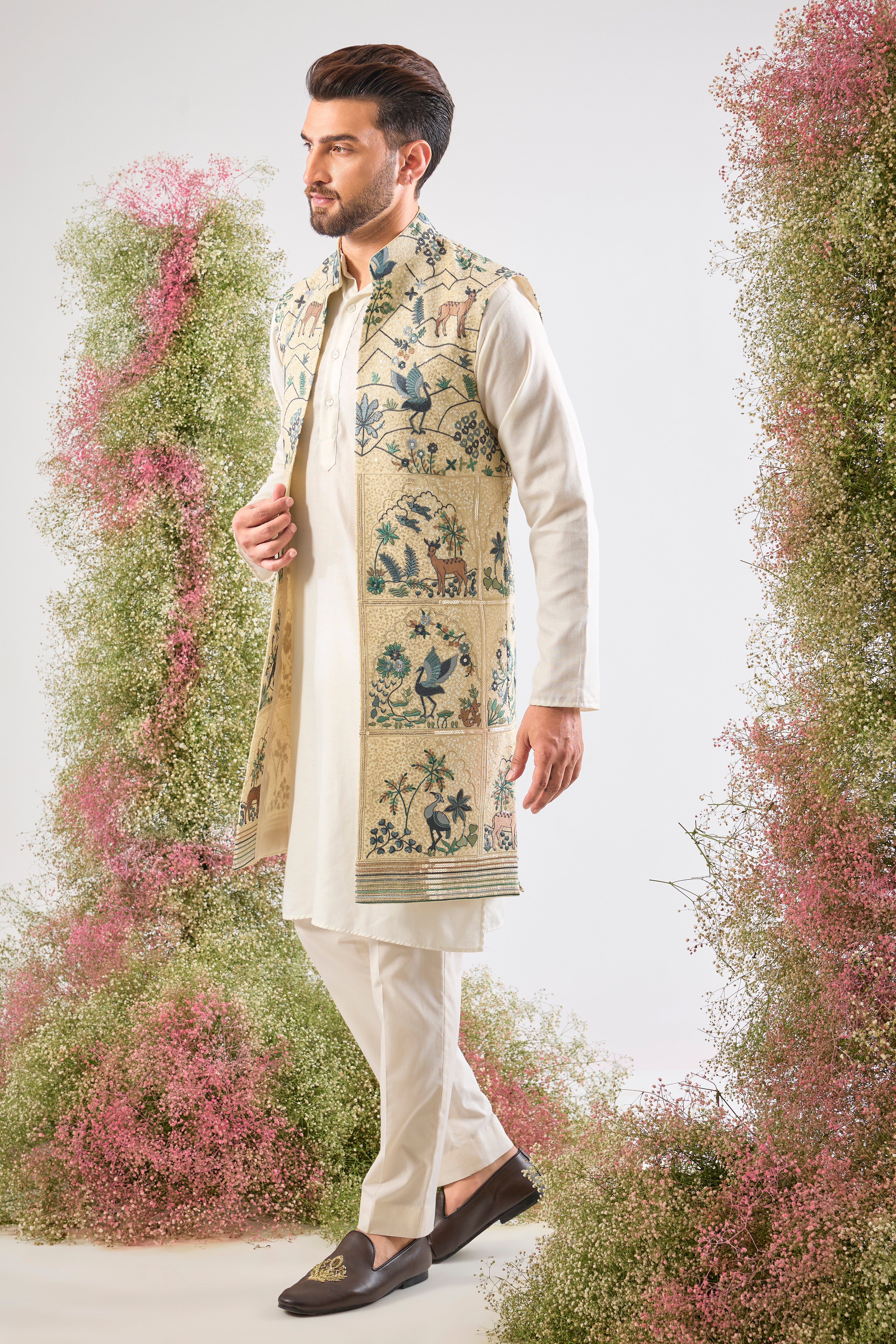 Cream luxury. Intricate beauty. Our Long Open Jacket features a dazzling sequined finish and detailed Flora and Fauna Interplay. Simply exquisite. 🦢