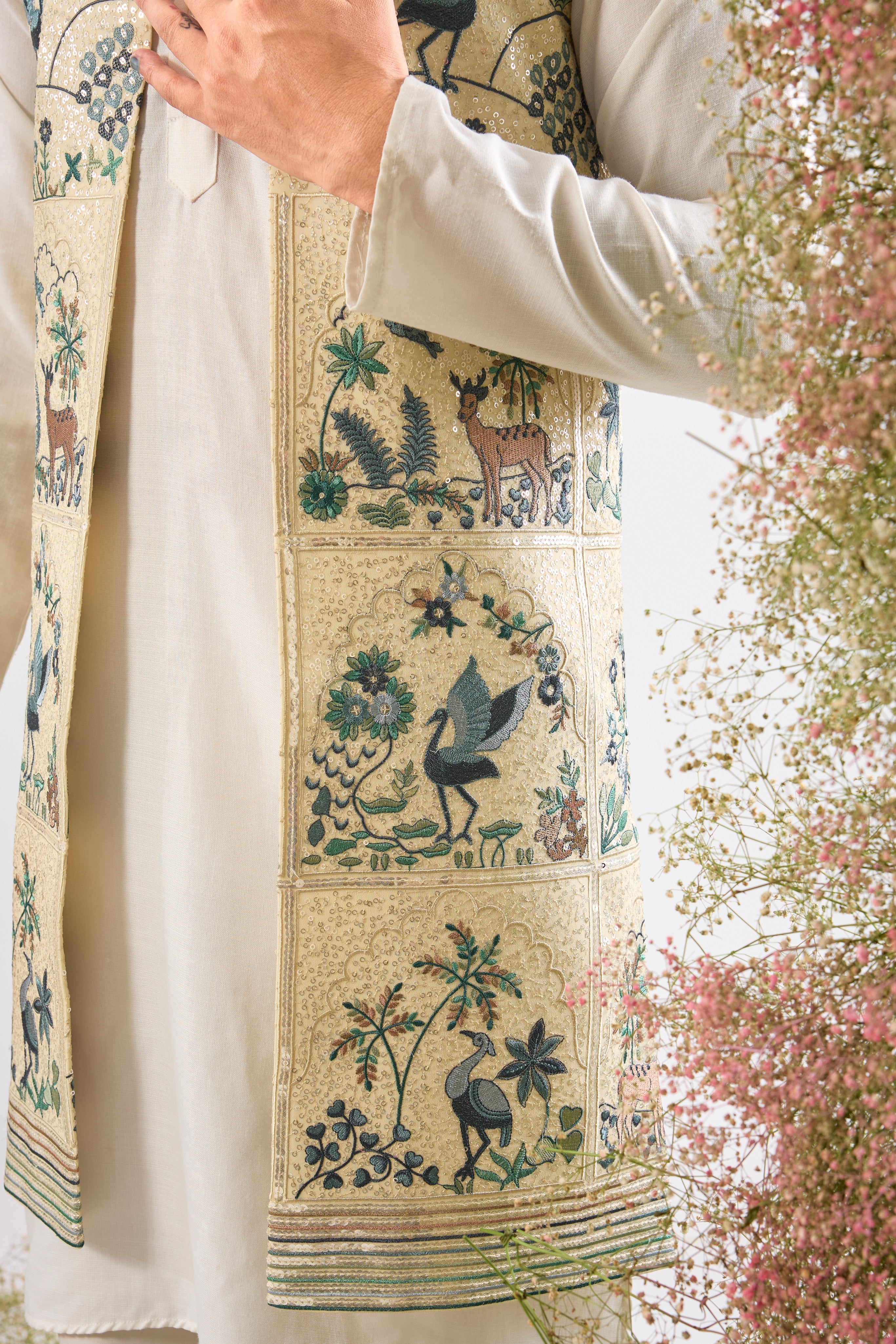 Cream luxury. Intricate beauty. Our Long Open Jacket features a dazzling sequined finish and detailed Flora and Fauna Interplay. Simply exquisite. 🦢