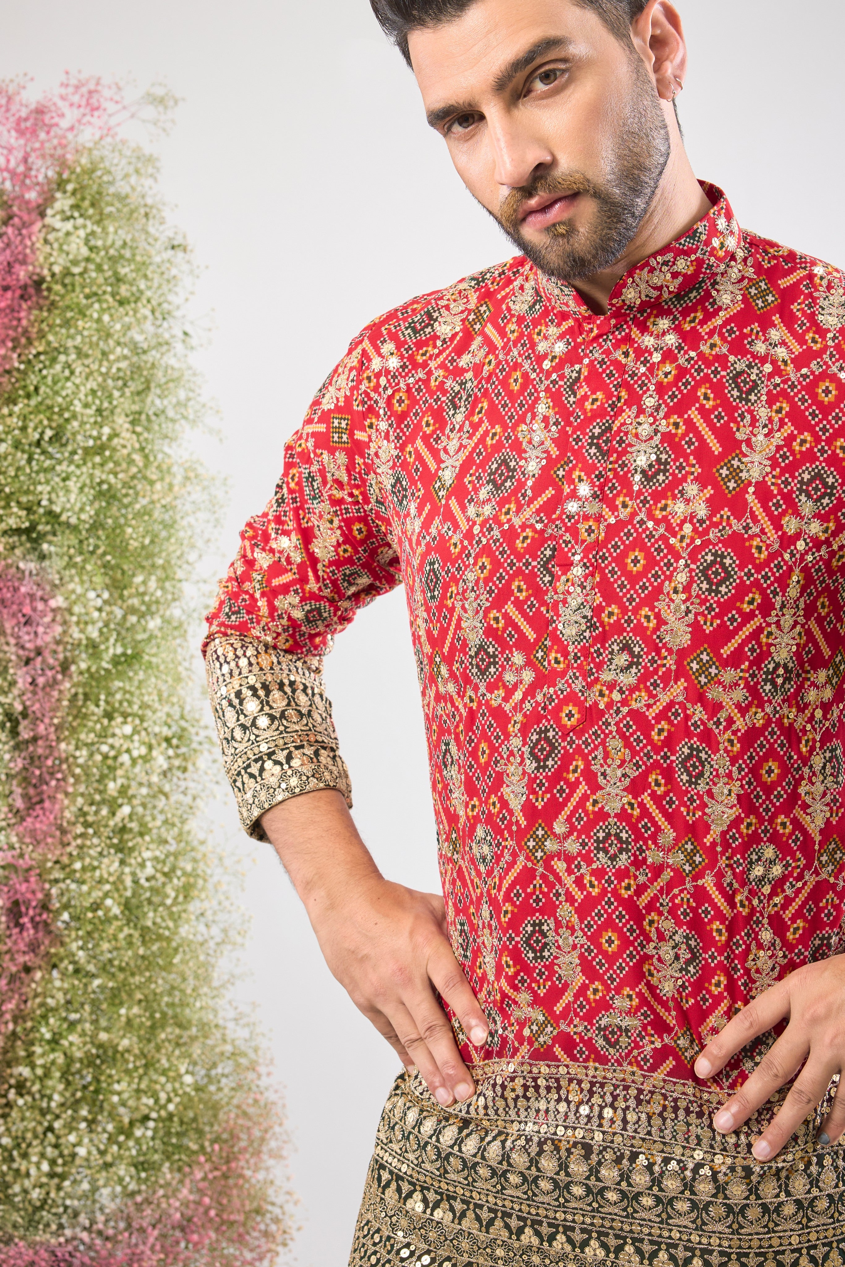 The perfect fusion! The classic appeal of Red Bandhani meets the grandeur of Intricate Zari and Sequin Work in this stunning Short Kurta. The textures and shine create a look of opulent elegance. 👑