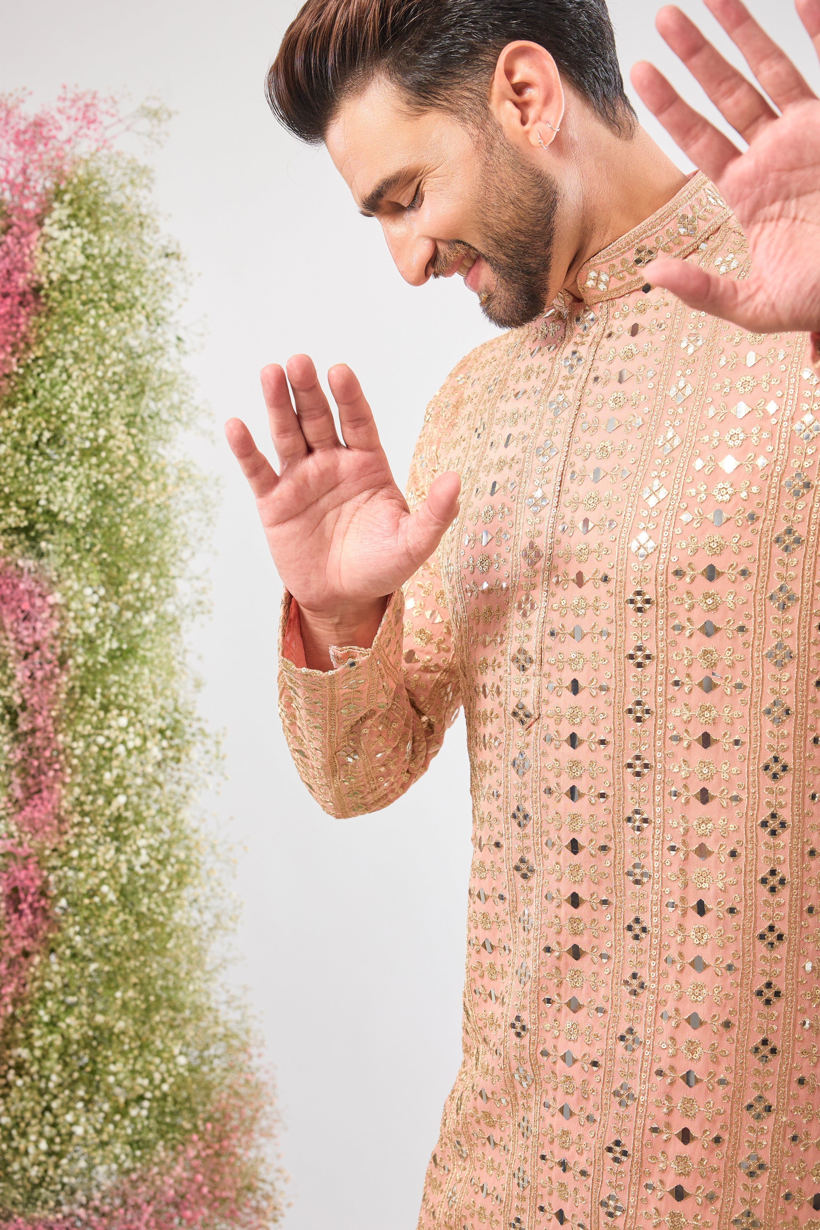Dazzling peach. Maximum shine. Our Kurta features Heavy Sequin Work that mimics a mirror shine, complemented by Intricate Thread Work. You'll steal the show! 💫