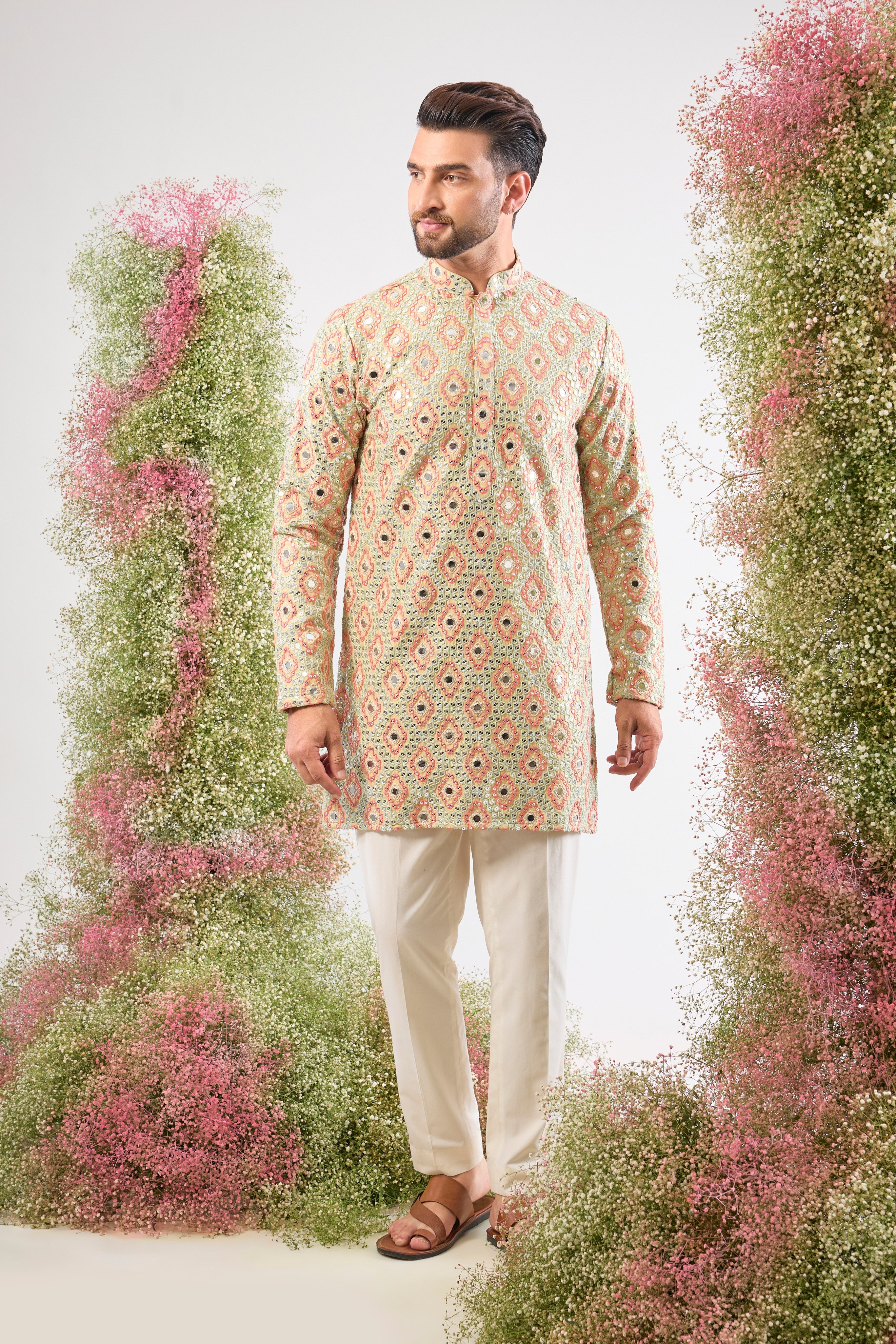 Cream brilliance. Colourful art. Our Short Kurta shines with mirror-effect Intricate Sequin Work and vibrant Multi-coloured Thread Work. Simply stunning!