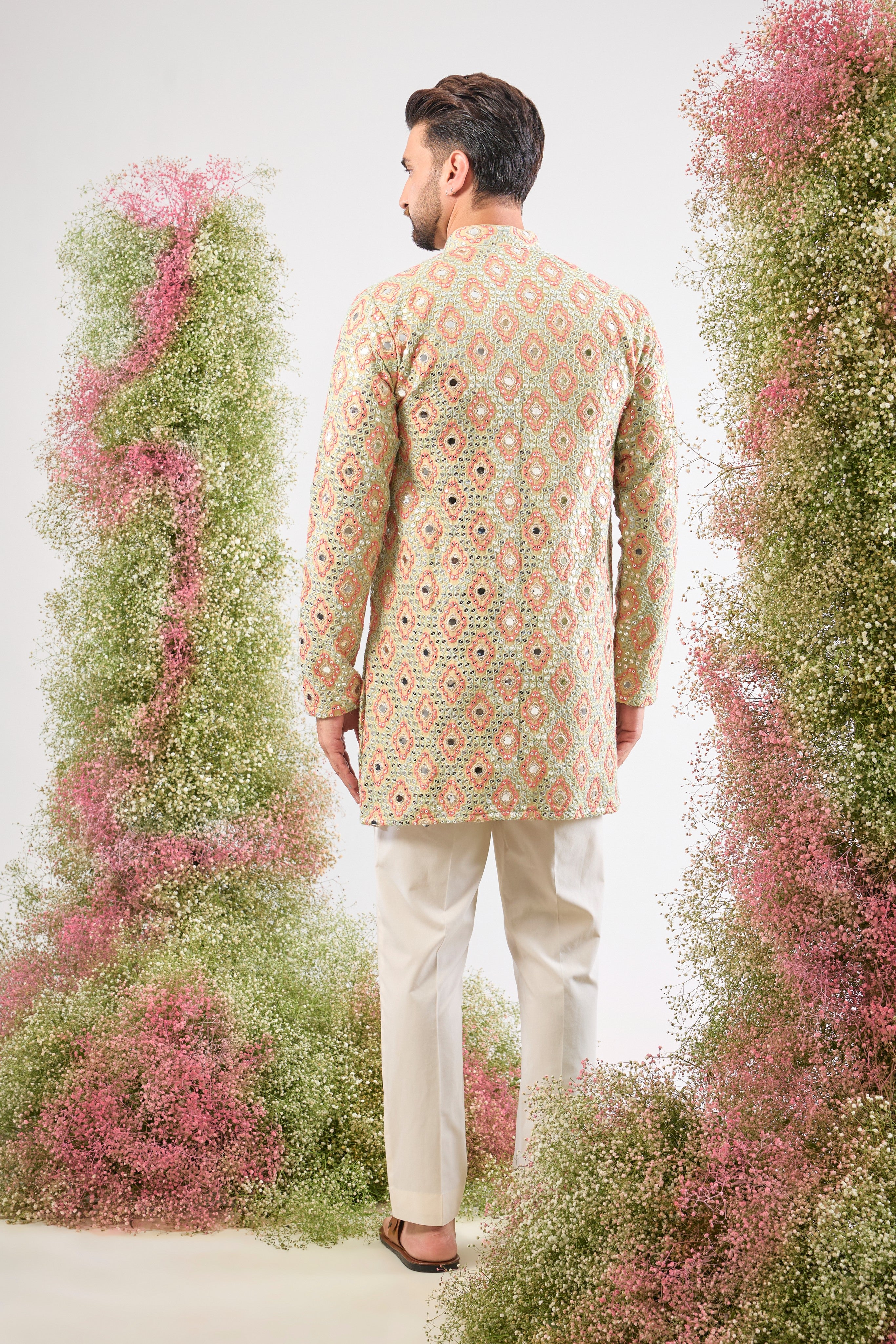 Cream brilliance. Colourful art. Our Short Kurta shines with mirror-effect Intricate Sequin Work and vibrant Multi-coloured Thread Work. Simply stunning!