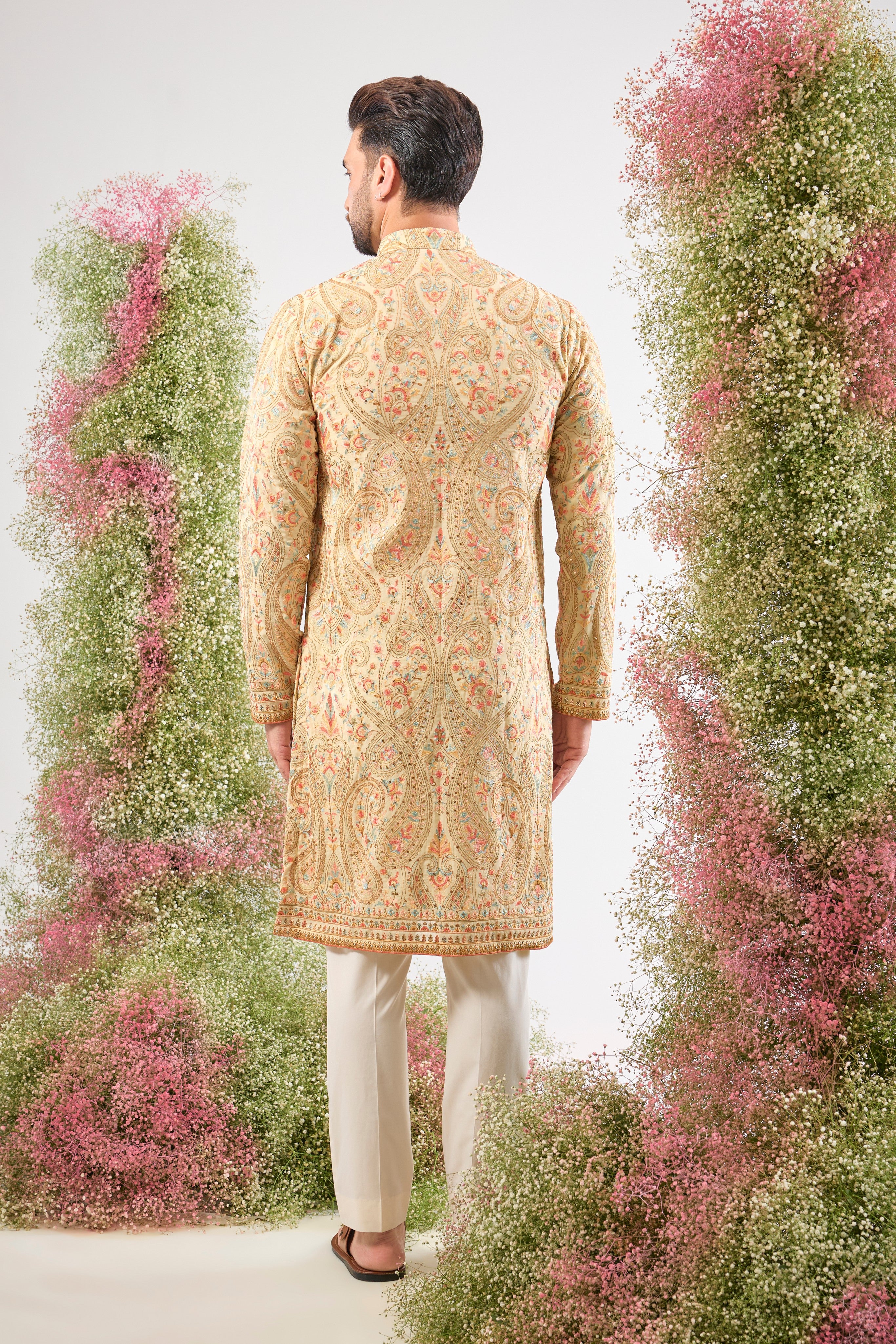 A celebration of thread and texture! This stunning Cream Kurta features exquisite Kashmiri Embroidery using a blend of Intricate Multi-threads. The result is a vibrant, textured pattern that brings depth and life to the classic cream base