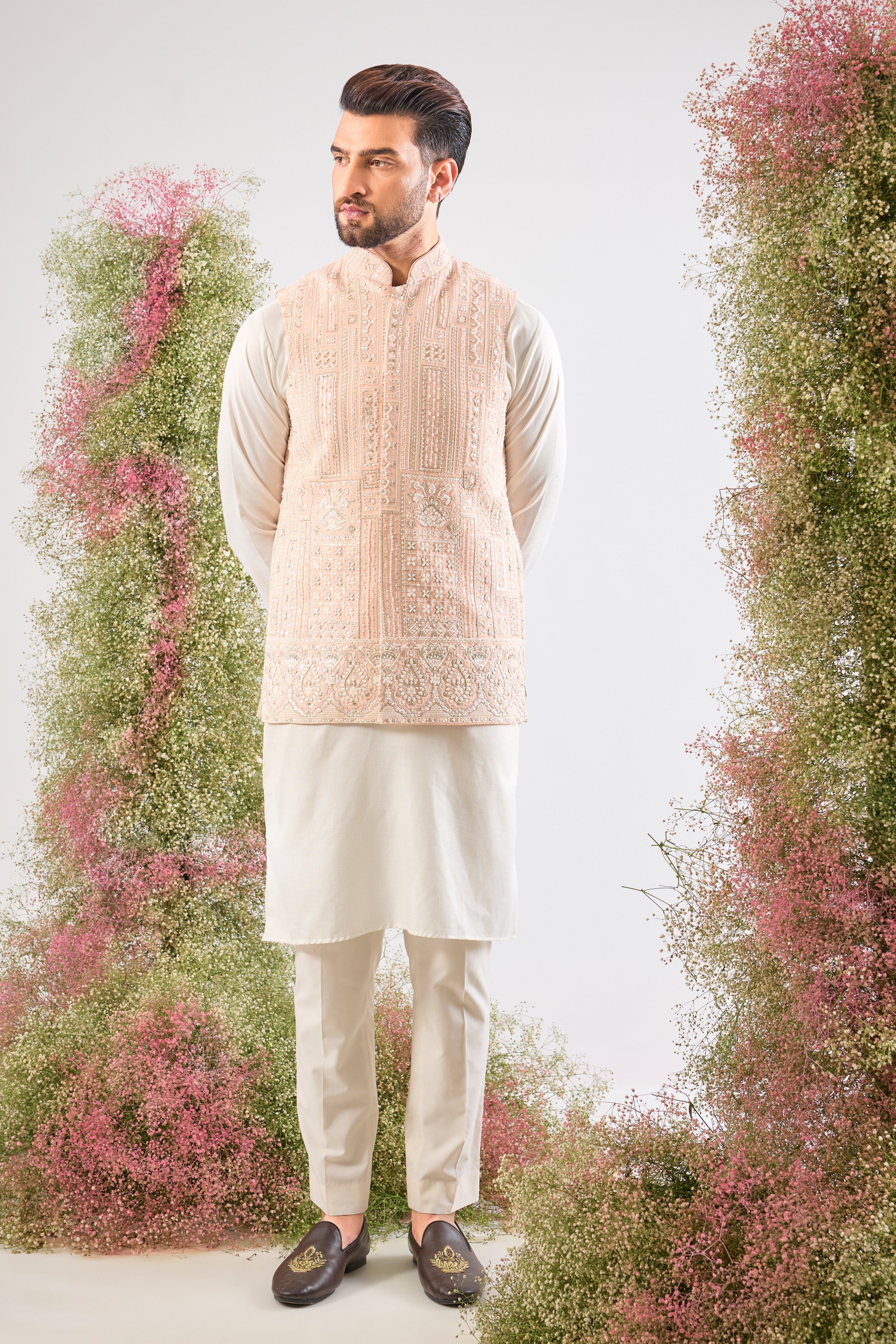 Pink perfection. Our Short Nehru Jacket features beautiful Hand Work with Detailed White Cut Dana and Sequins. Pure elegance.