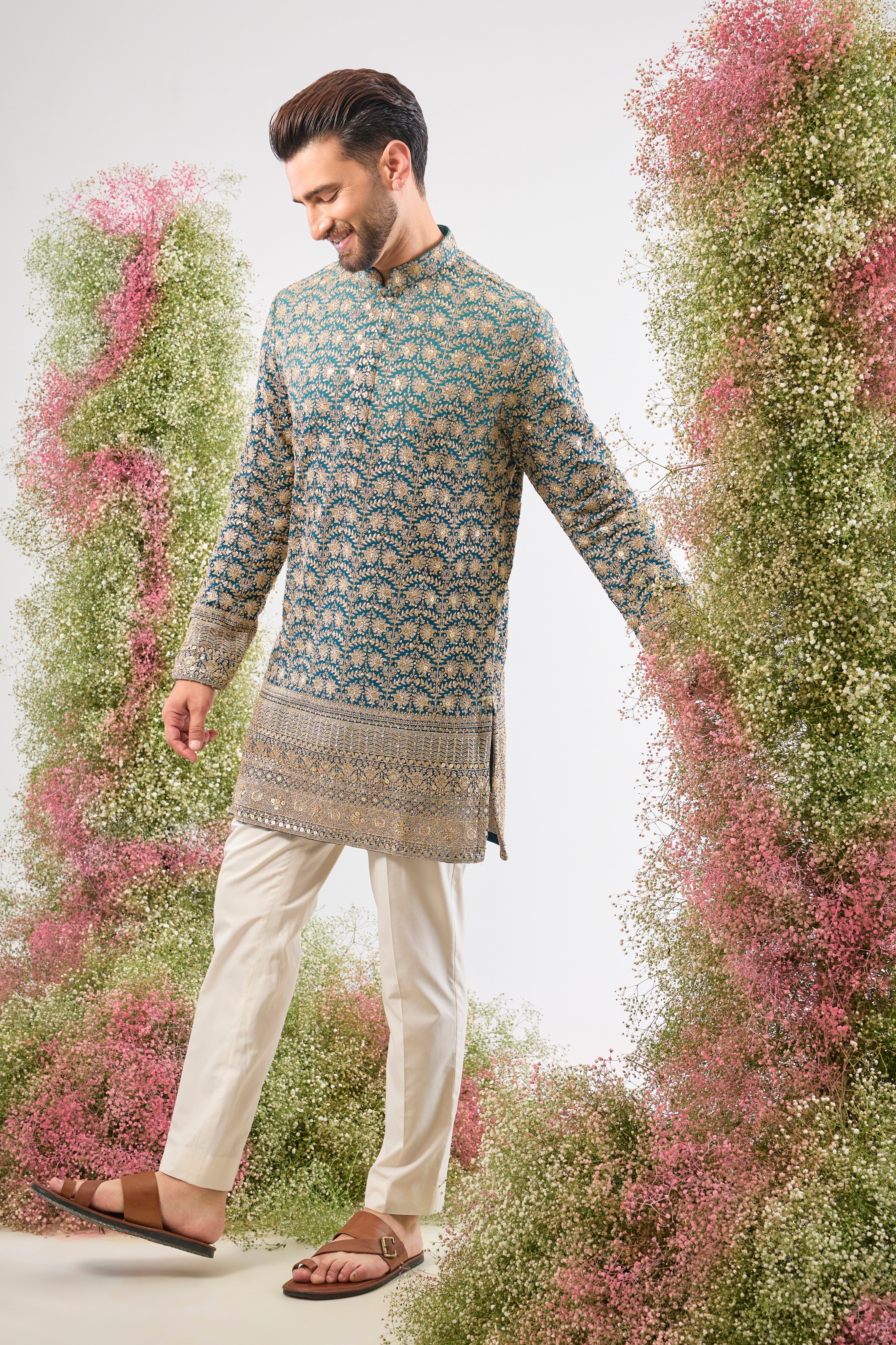 Blue Ombre brilliance. Our Short Kurta is fully adorned with Heavy Zari Work and shimmering sequin details. Bold style, short silhouette.