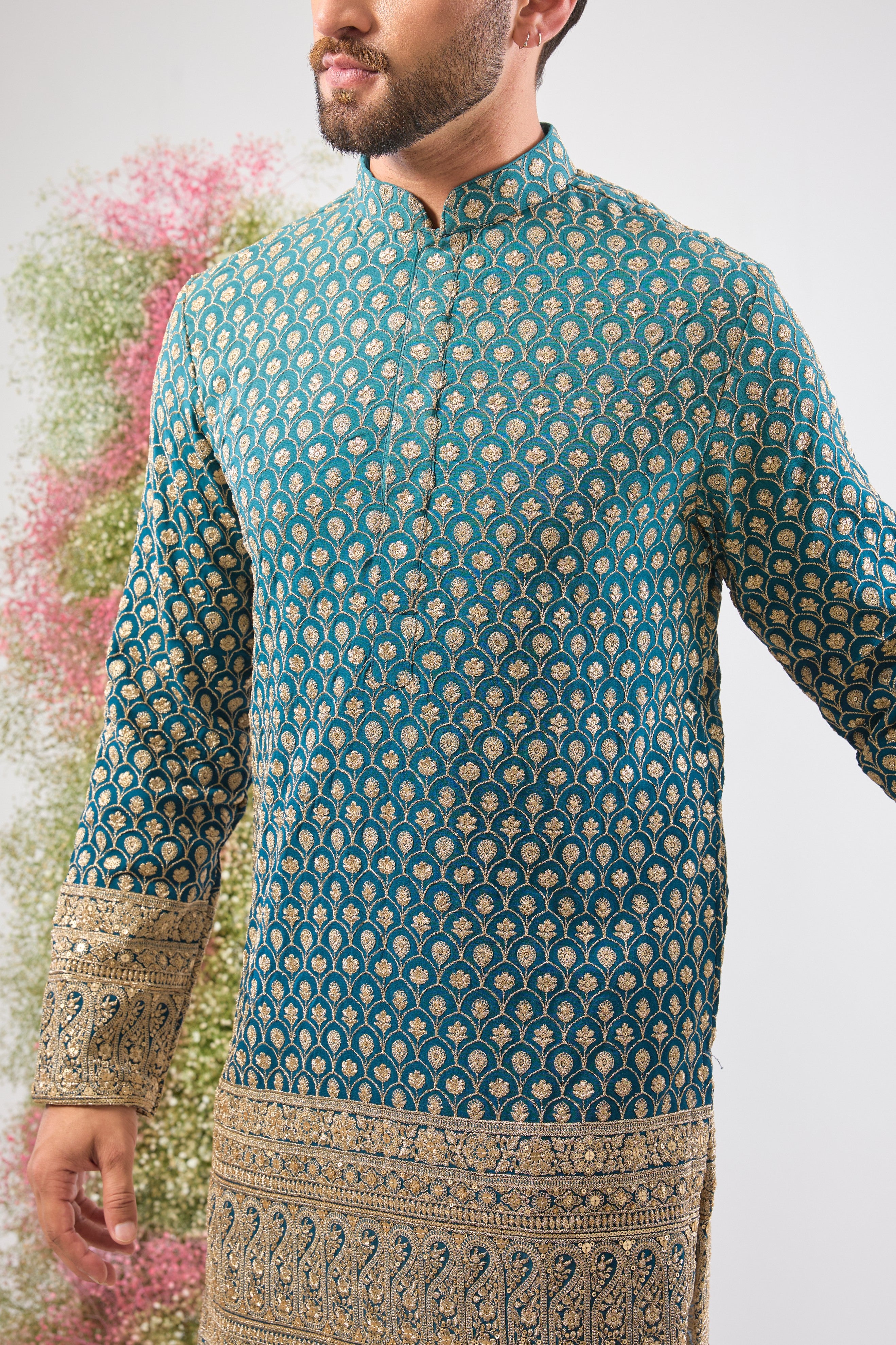 Blue Ombre brilliance. Our Short Kurta is fully adorned with Heavy Zari Work and shimmering sequin details. Bold style, short silhouette.