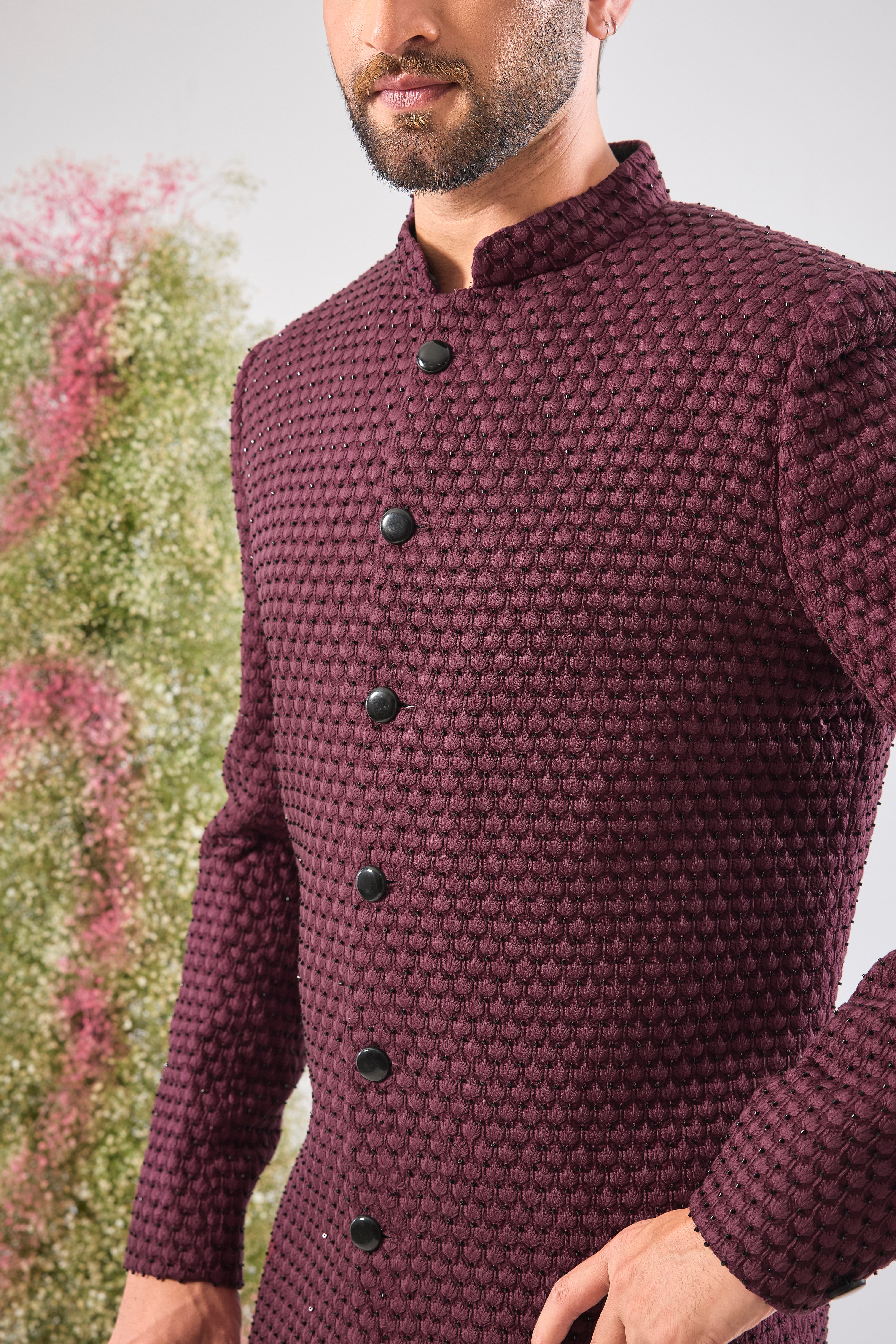 This Sherwani showcases beautiful Detailed Tone-to-Tone Thread Work, creating depth and richness on the fabric. The subtle, yet dramatic contrast of Black Cut Dana elevates the design, lending it a contemporary edge.