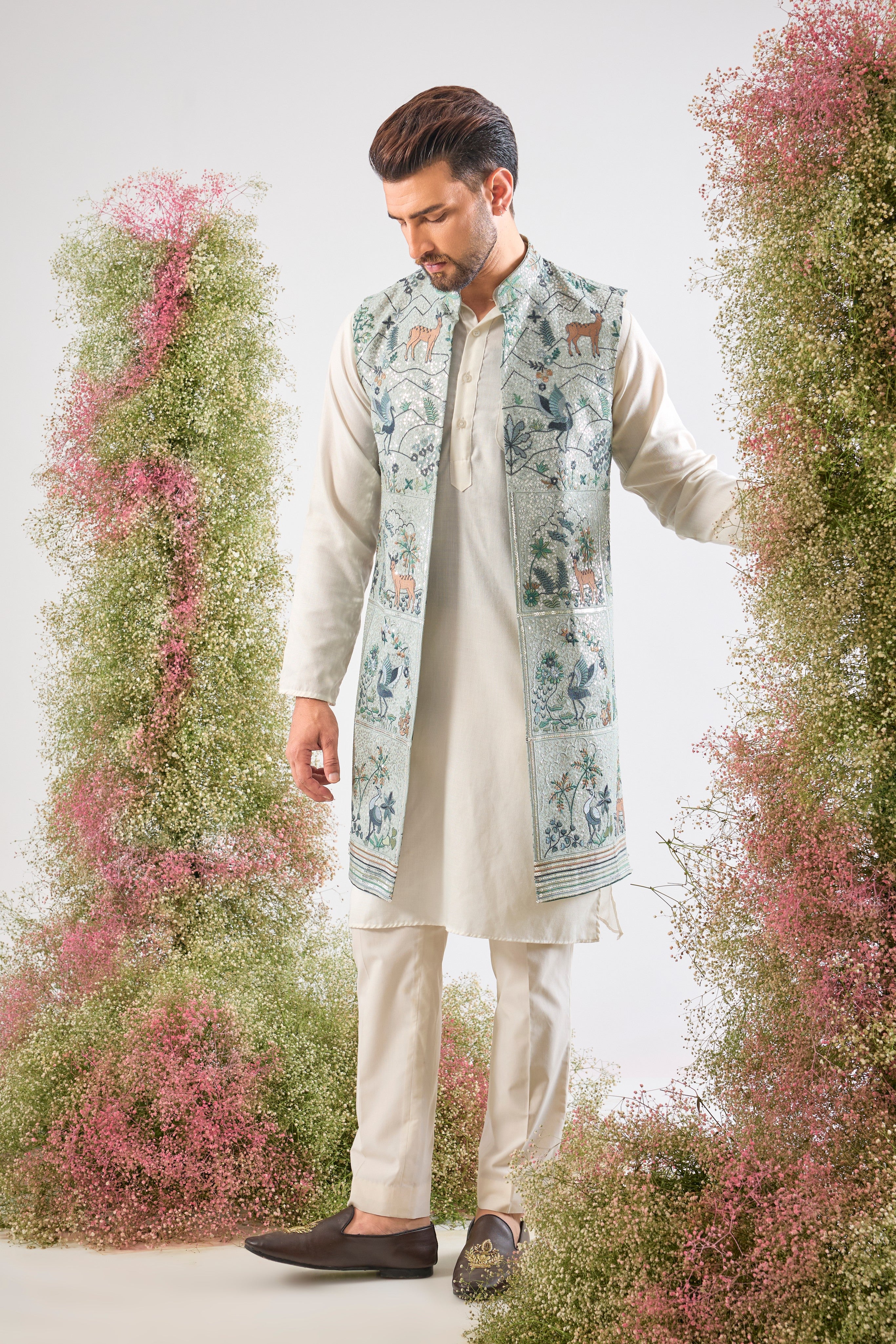 This Long Open Jacket is a masterpiece of light and detail, showcasing a beautiful,