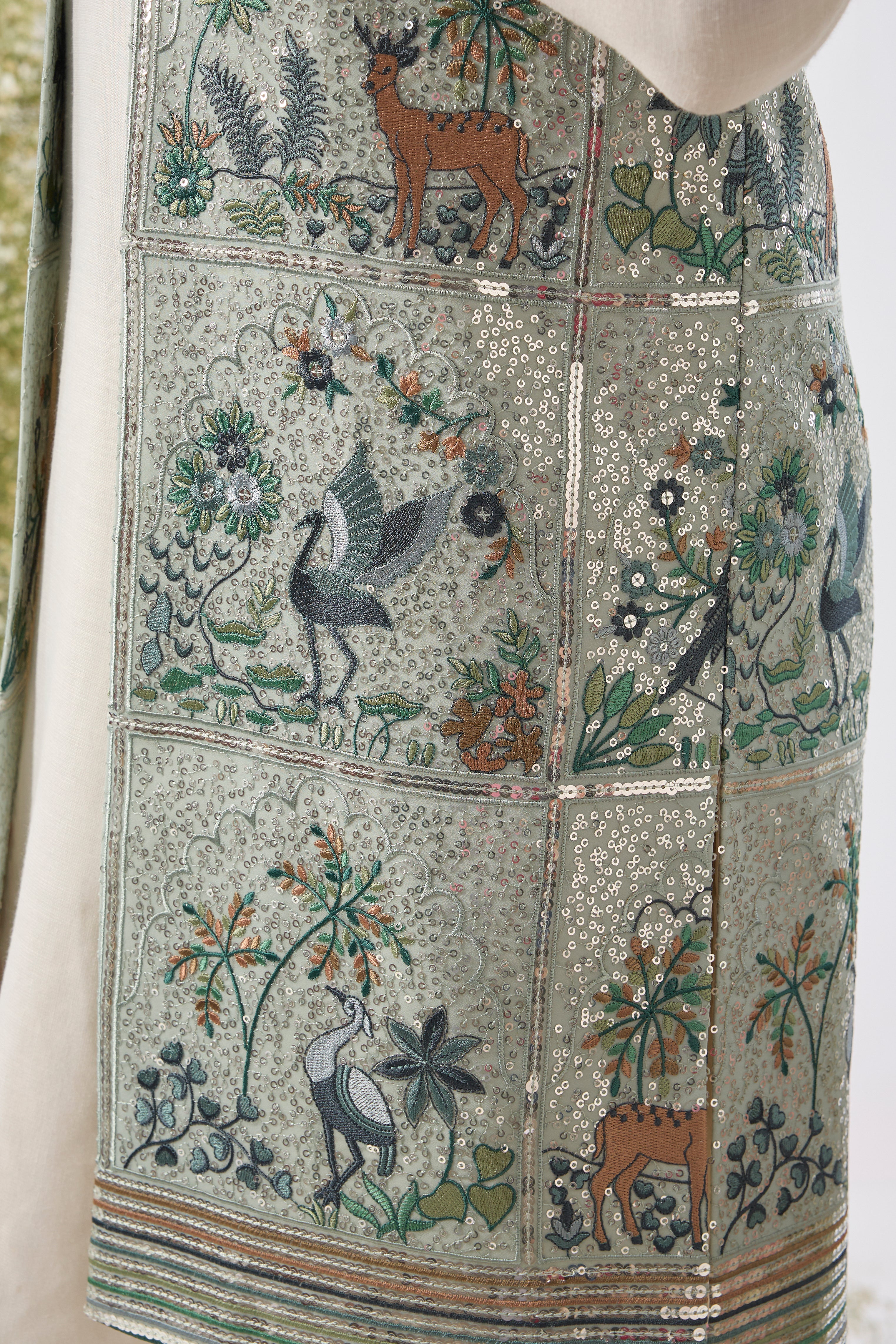 This Long Open Jacket is a masterpiece of light and detail, showcasing a beautiful,