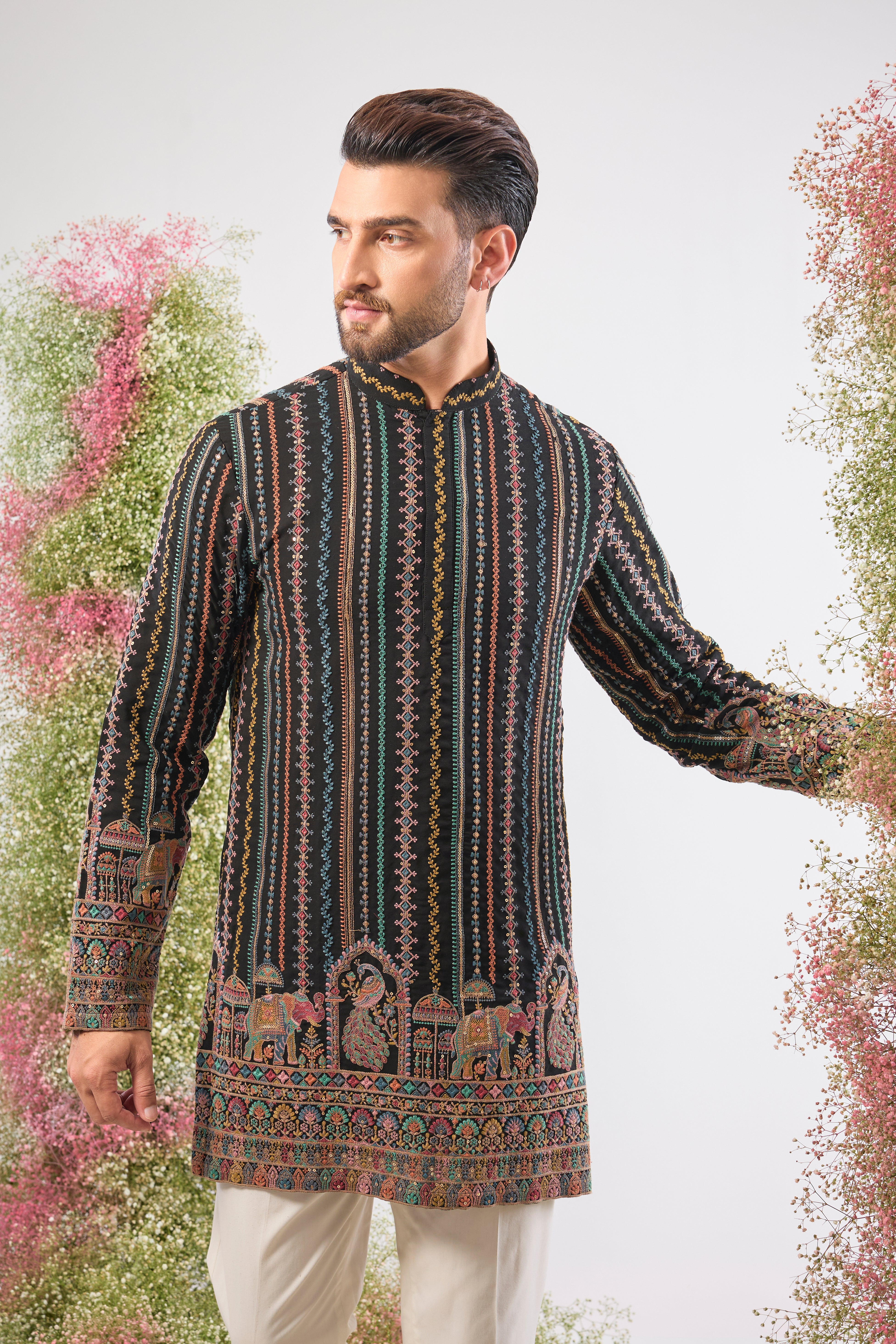 This Multi-coloured Short Kurta showcases a striking contrast between structured Detailed Thread Work Stripes and organic, l