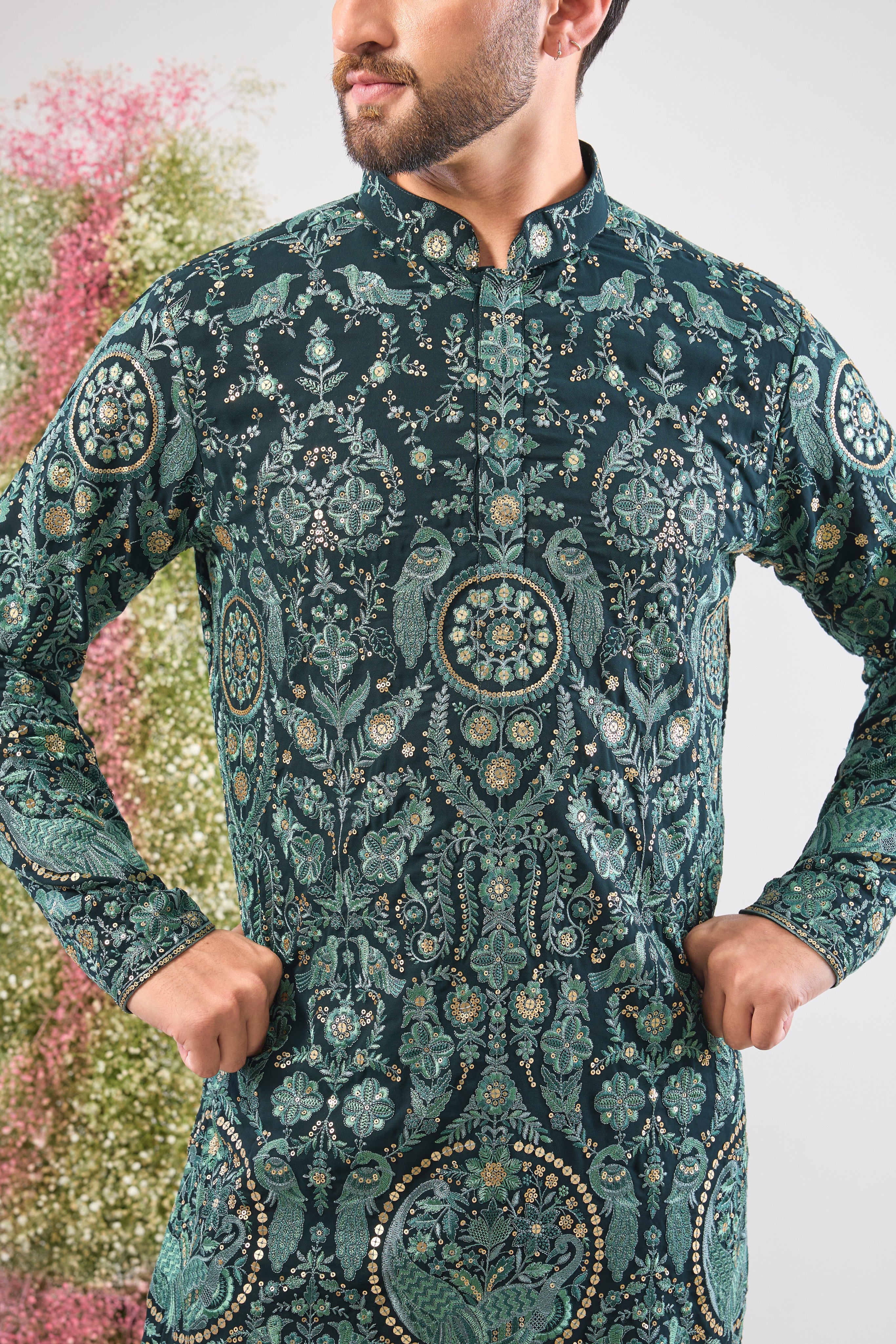 This Short Thread Work Kurta is lavishly detailed with intricate craftsmanship, featuring Detailed Flora and Fauna Embroidery and brilliant Detailed Sequins. The rich colour and complex texture create an opulent look designed to stand out.