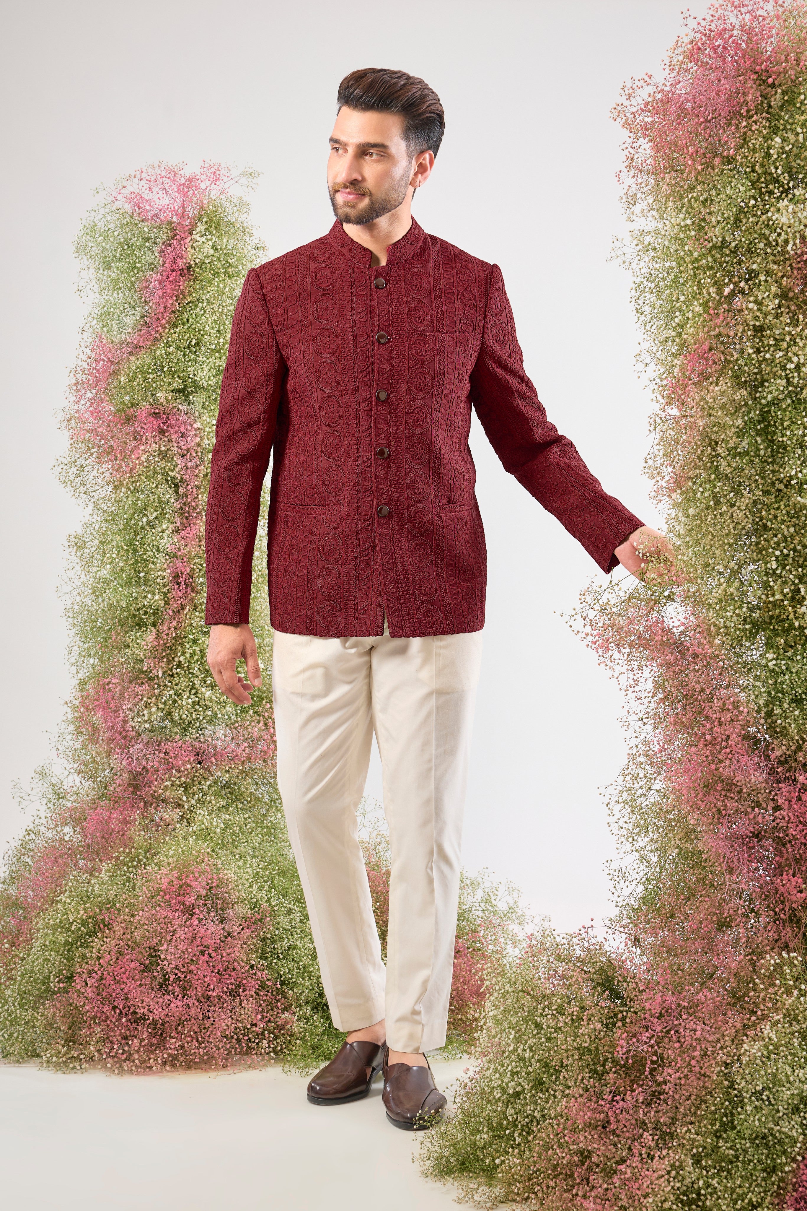 This Maroon Bandhgala is incredibly classy and subtle, showcasing spectacular Heavy Doori Work that creates luxurious, textural depth. Designed for a discerning eye, this outfit guarantees a super classy look without any bling