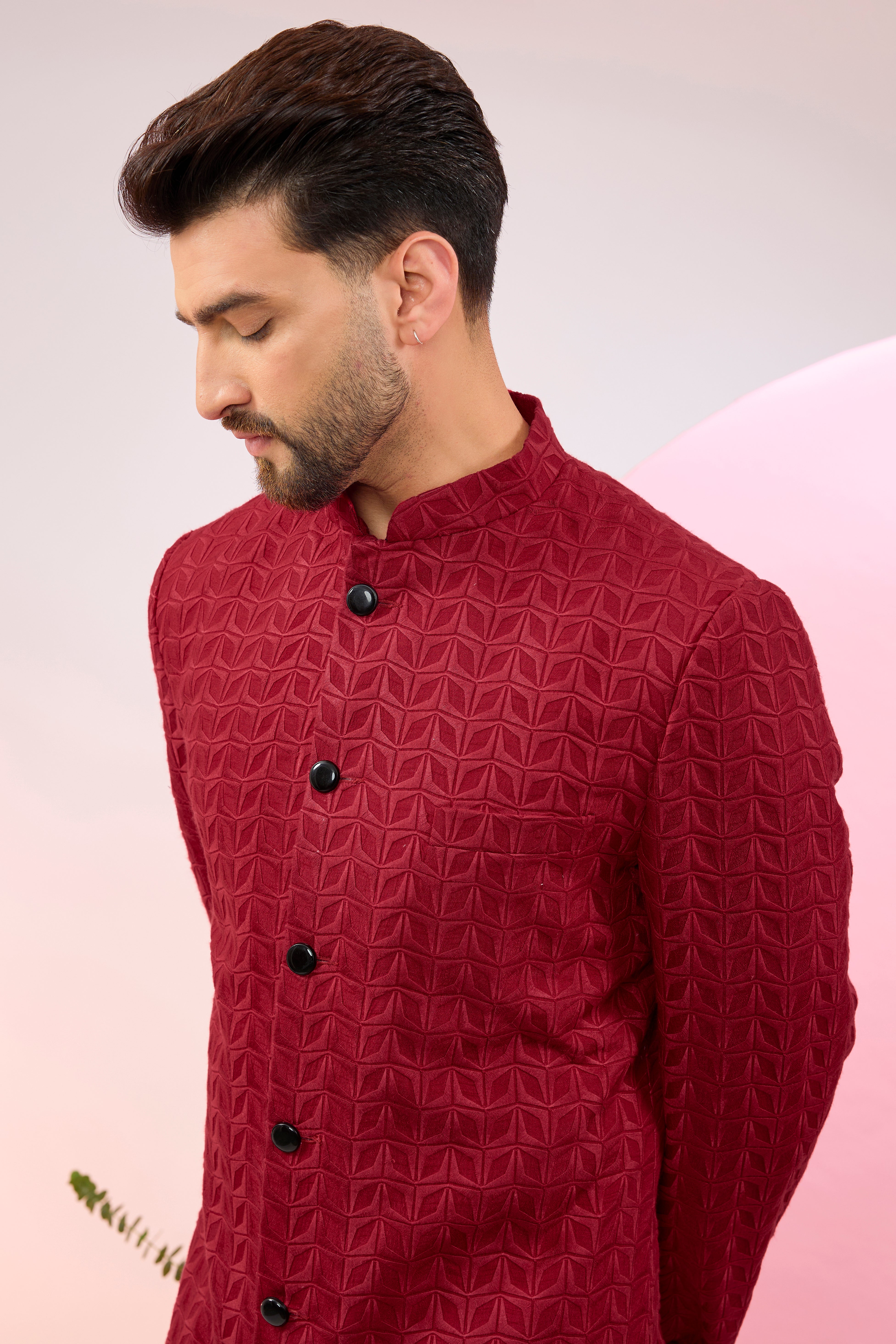 Red thread work sherwani.