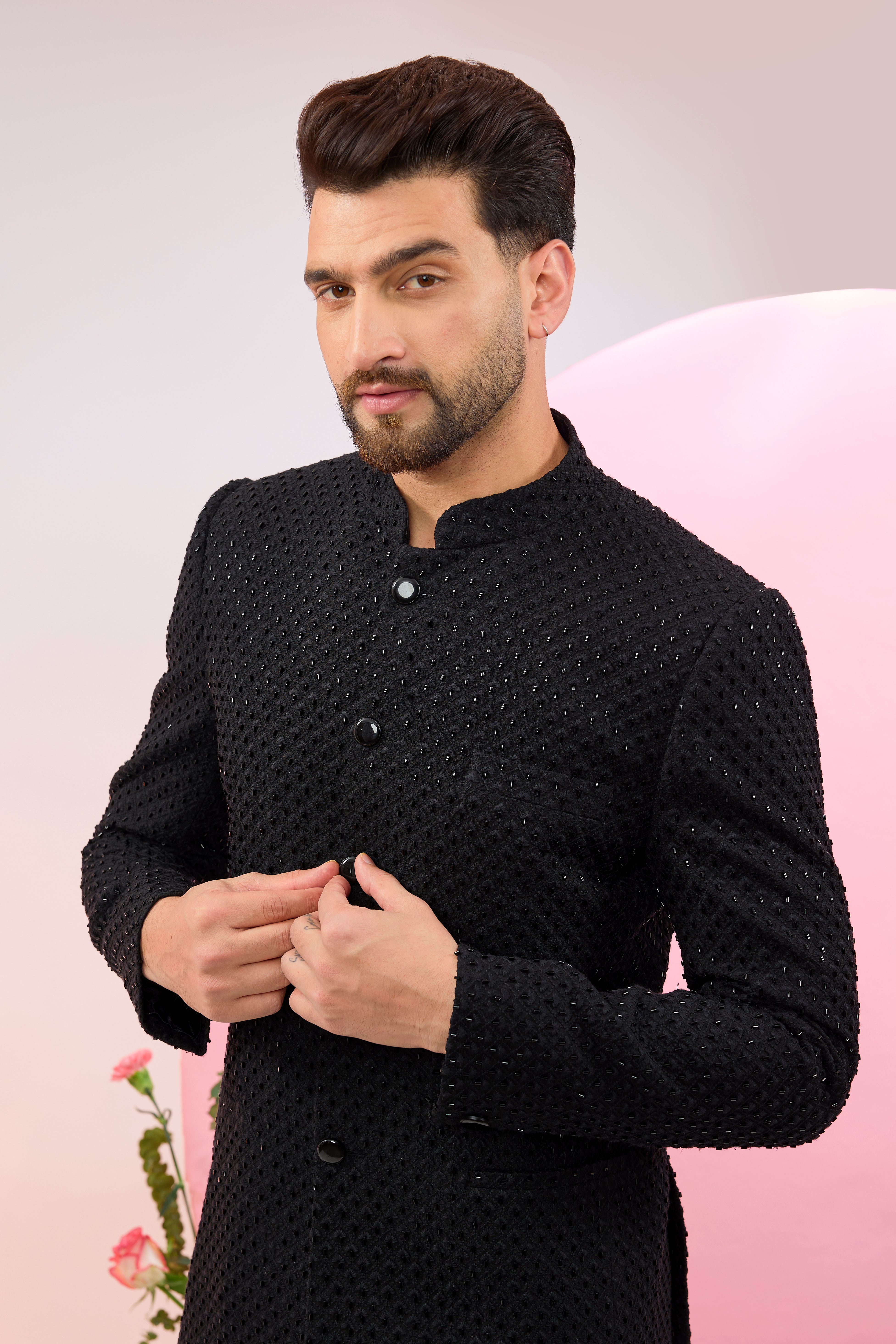 Black bandhgala with intricate cut-dana embroidery.