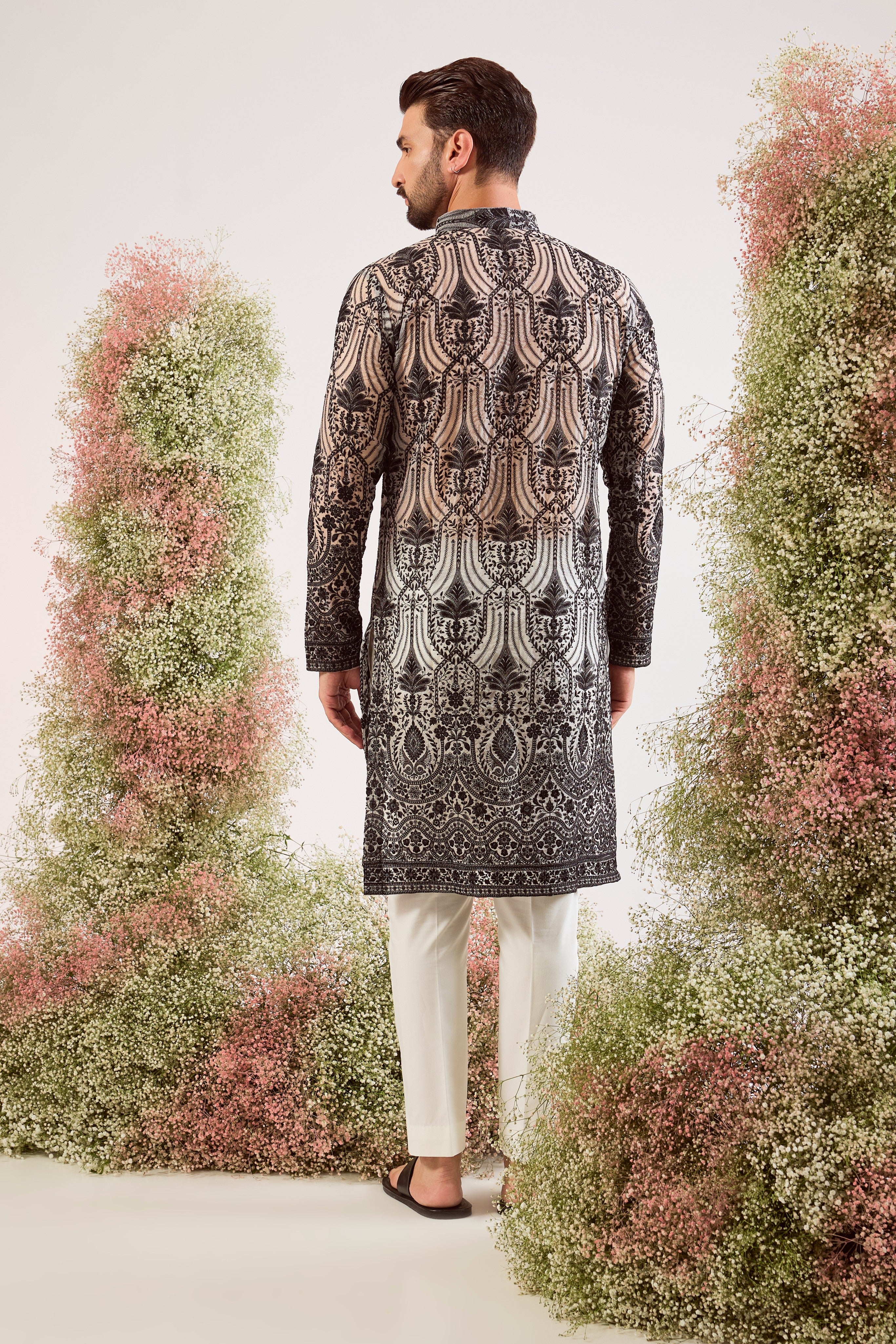 black see through long chikankari kurta on orgzanza with intricate sequin work