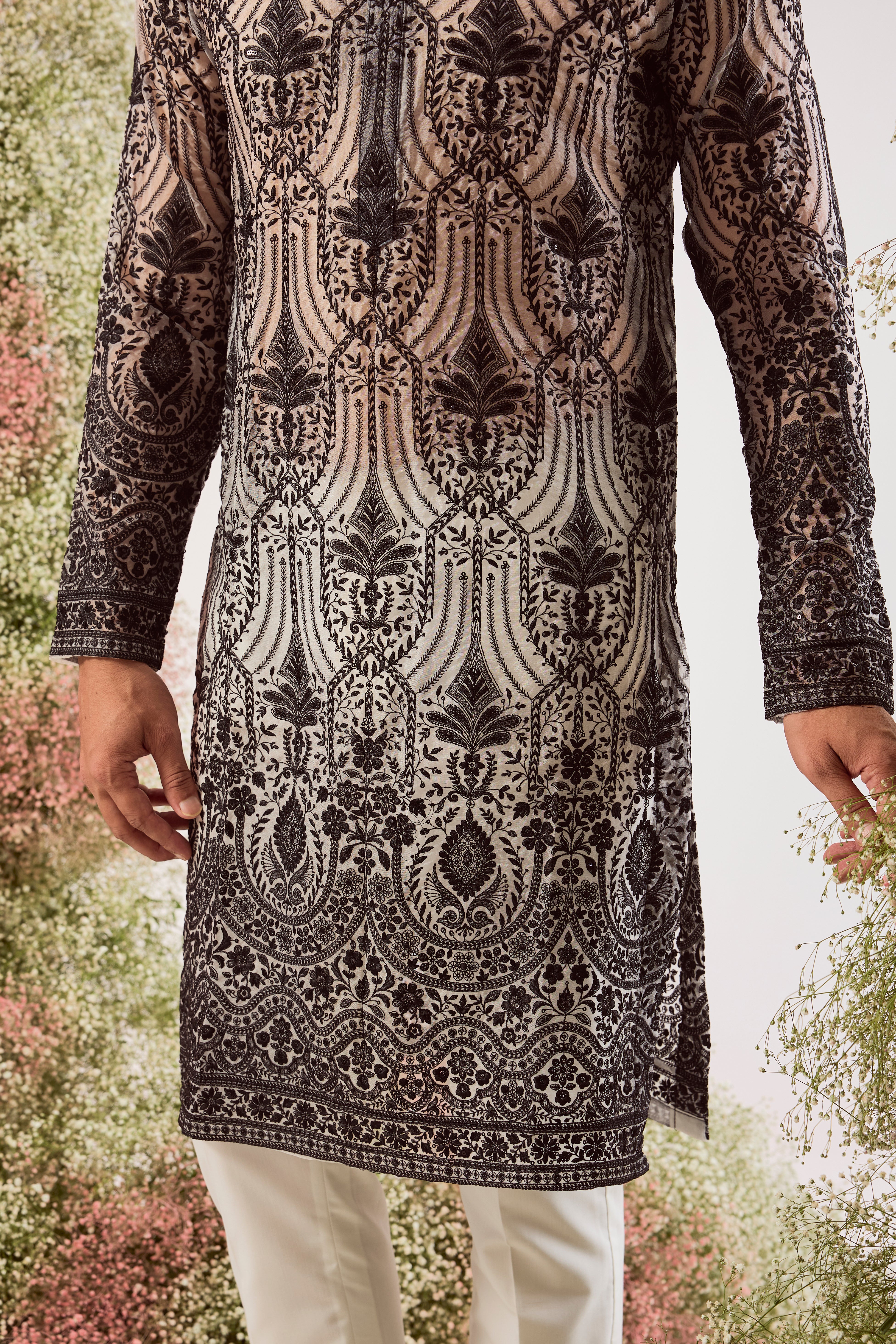 black see through long chikankari kurta on orgzanza with intricate sequin work