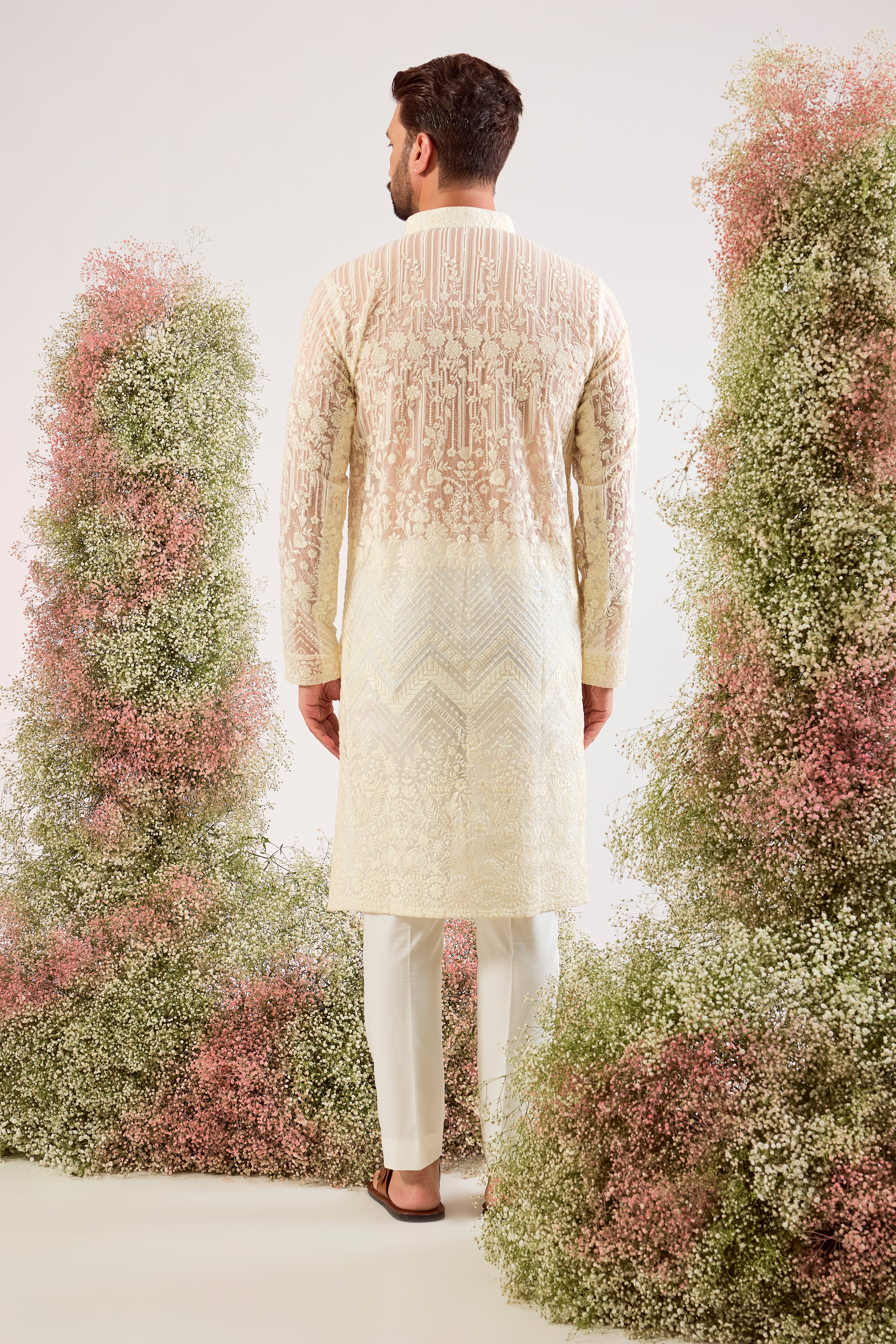 white see through chikankari kurta on organza with inricate floral embroidery and sequin work