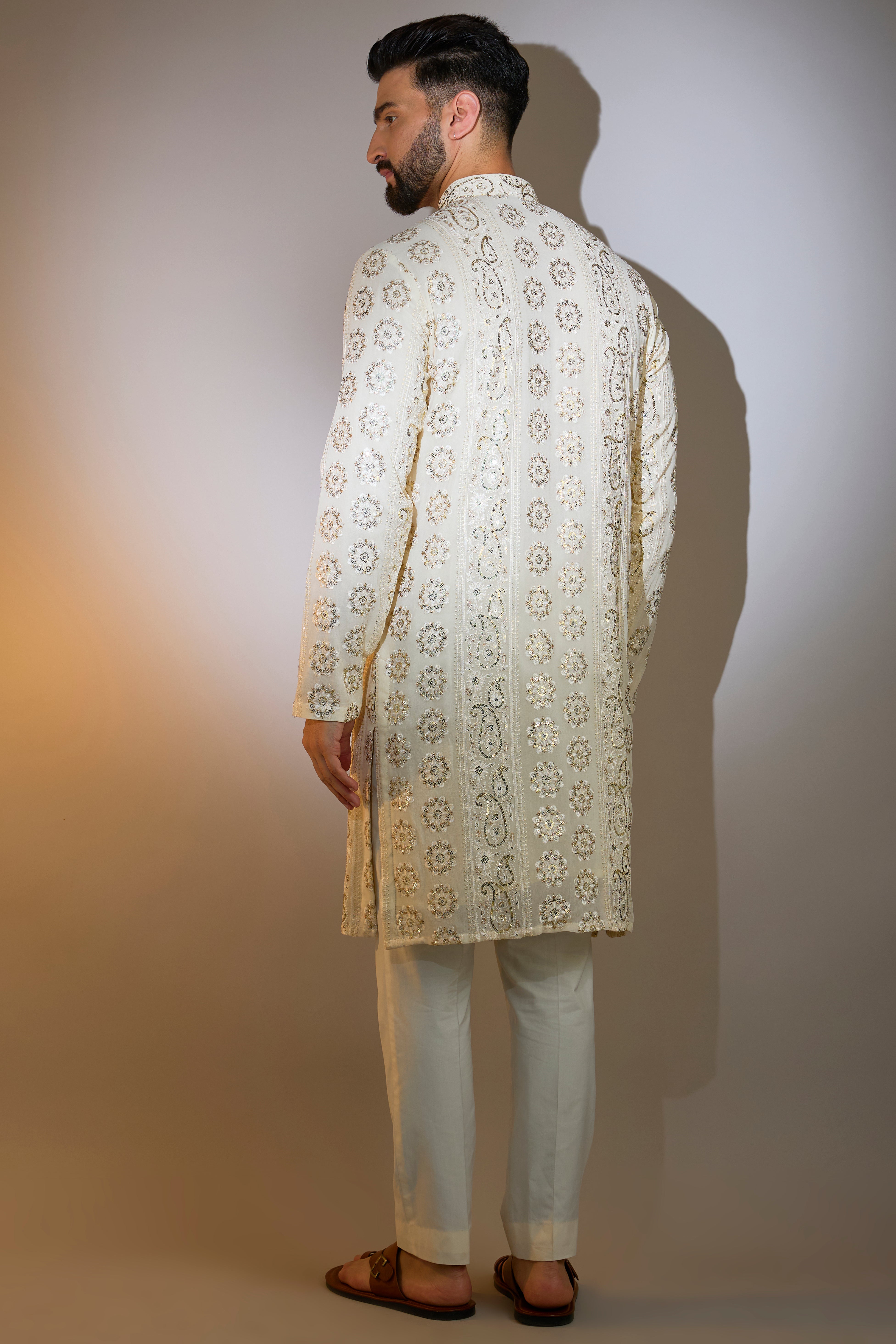 beige chikabkari kurta with sequin deatiling