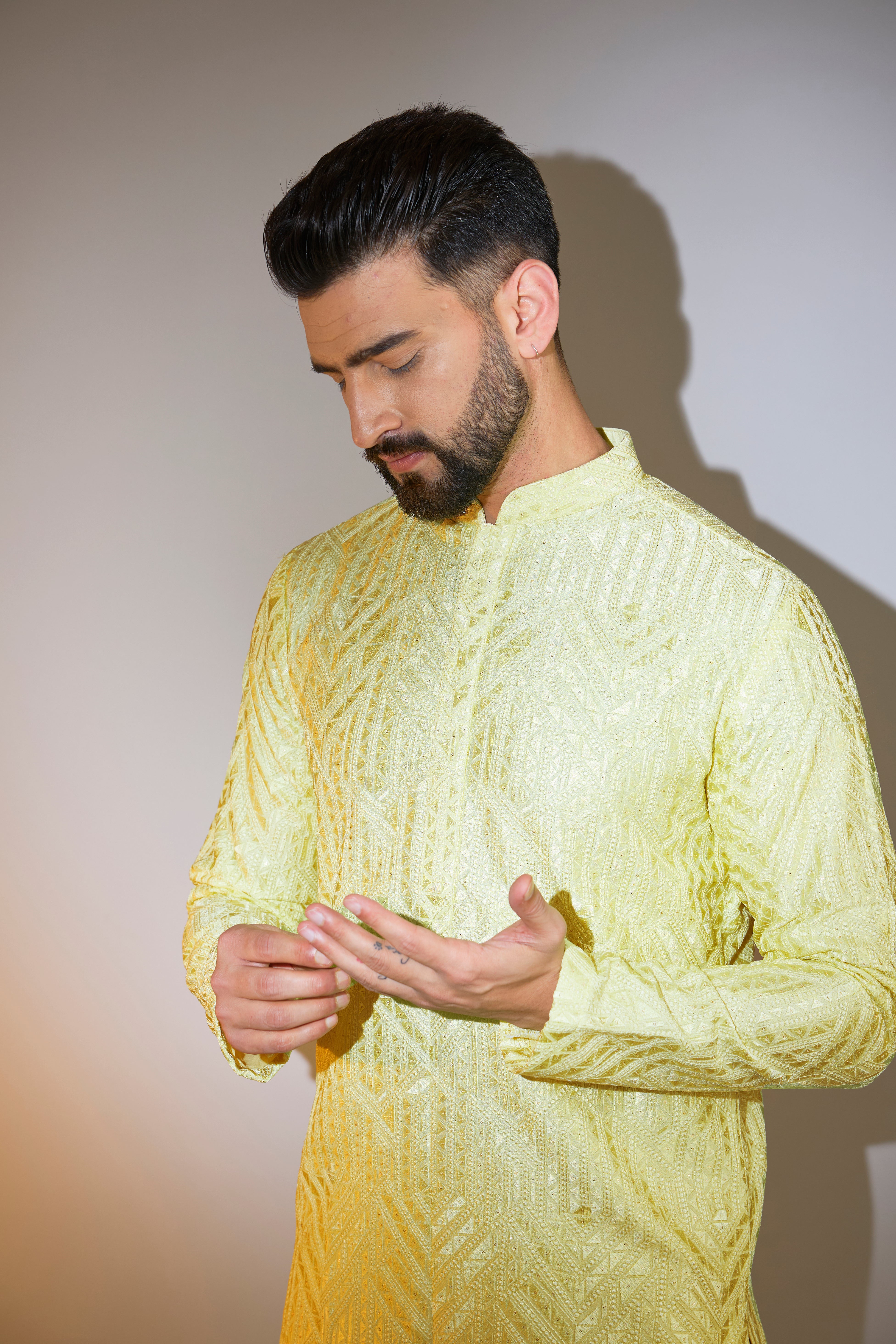 yellow geometrically embroidried thread work kruta