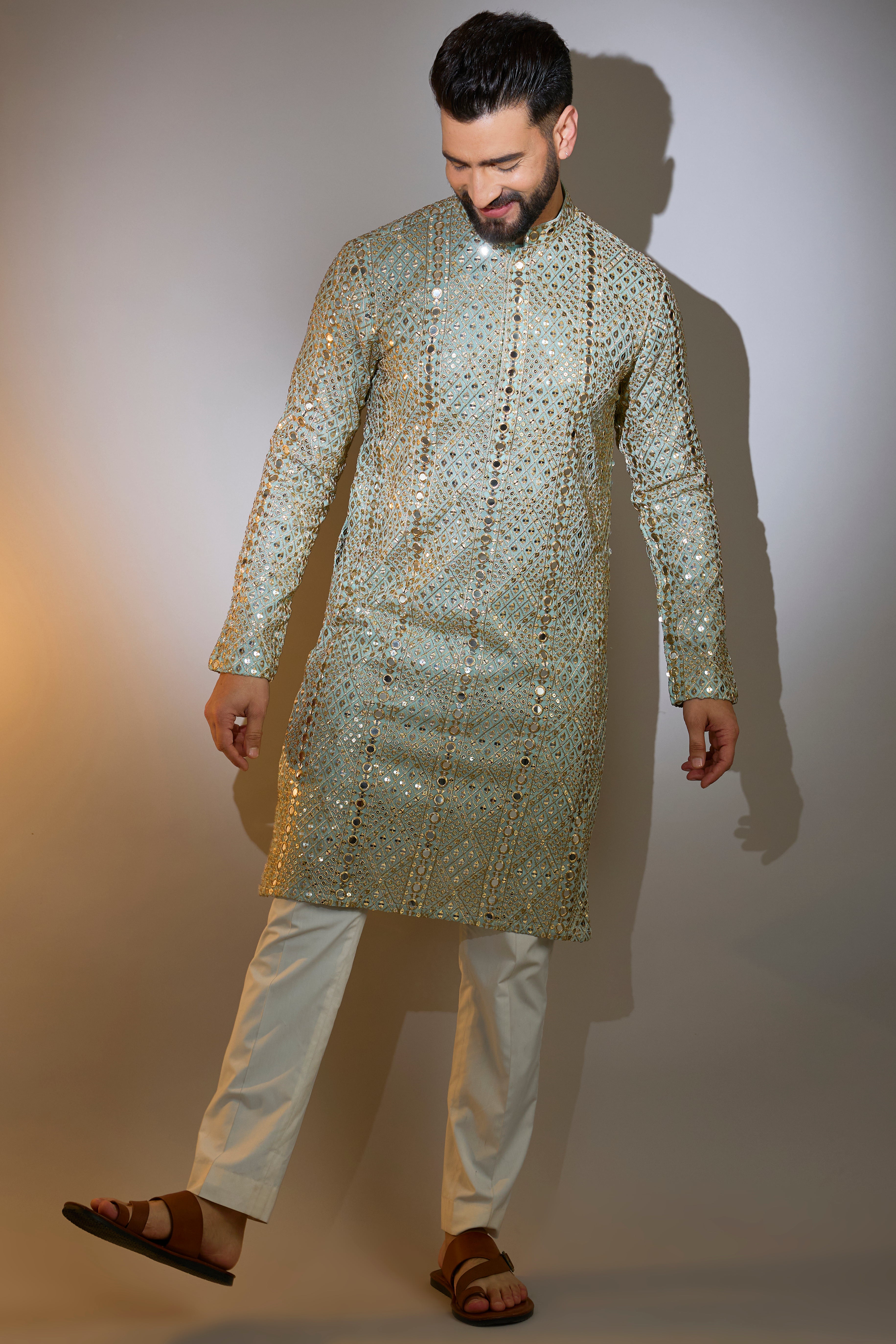 blue mirror work kurta with heazy zari detailing